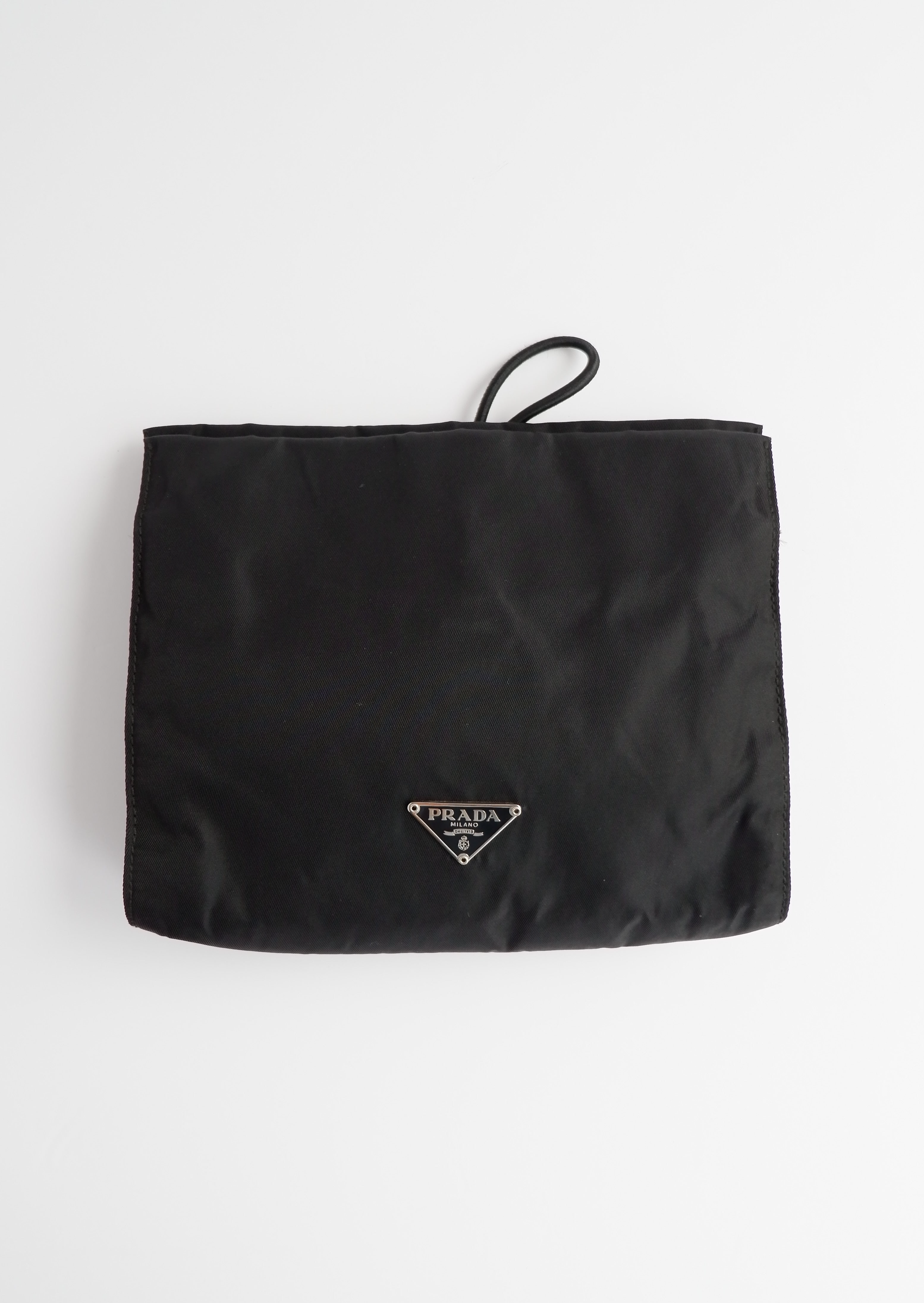 Pochette micro Prada authentique d'occasion en nylon noir