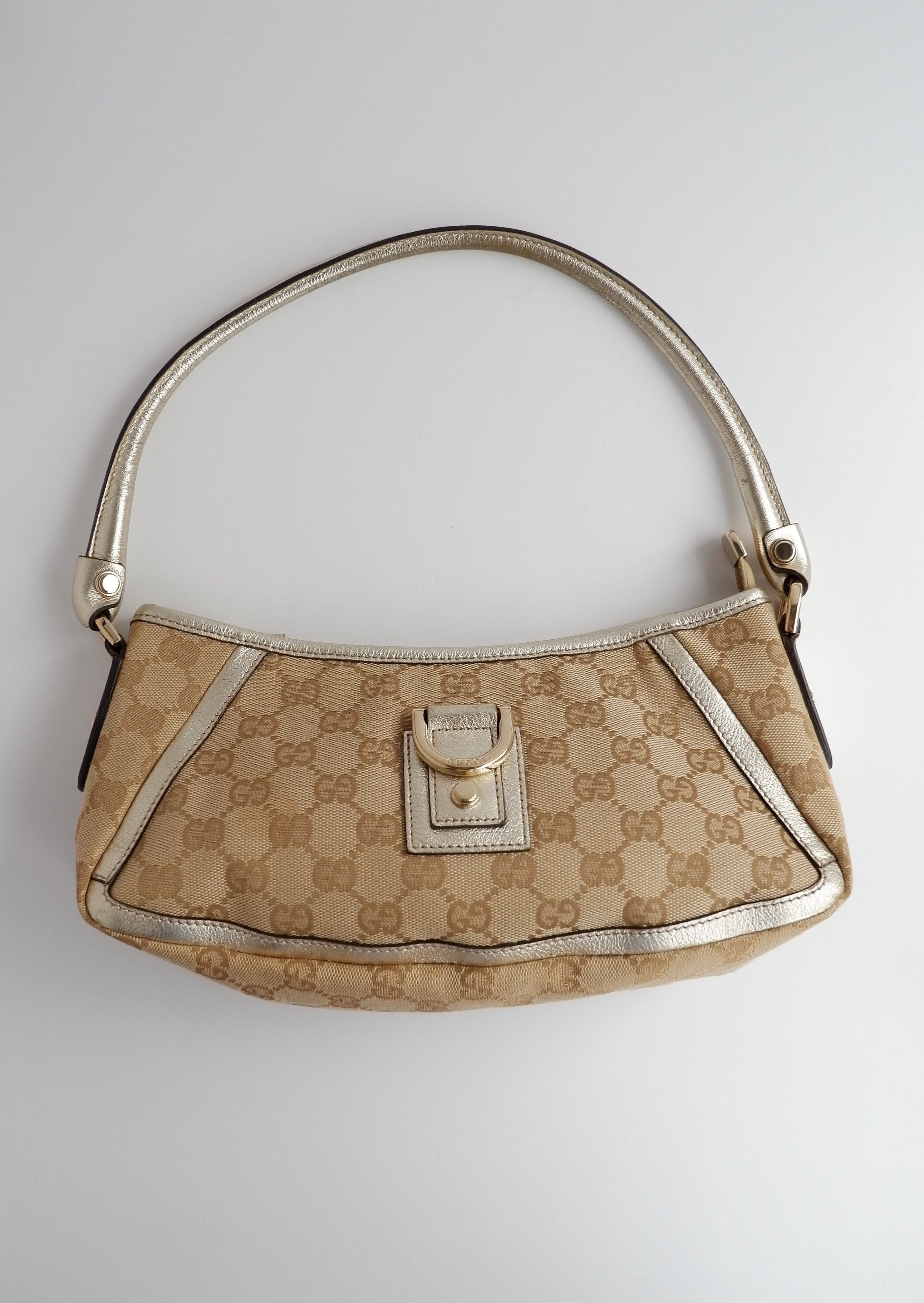 Sac bandoulière Gucci authentique d'occasion en toile GG beige/doré