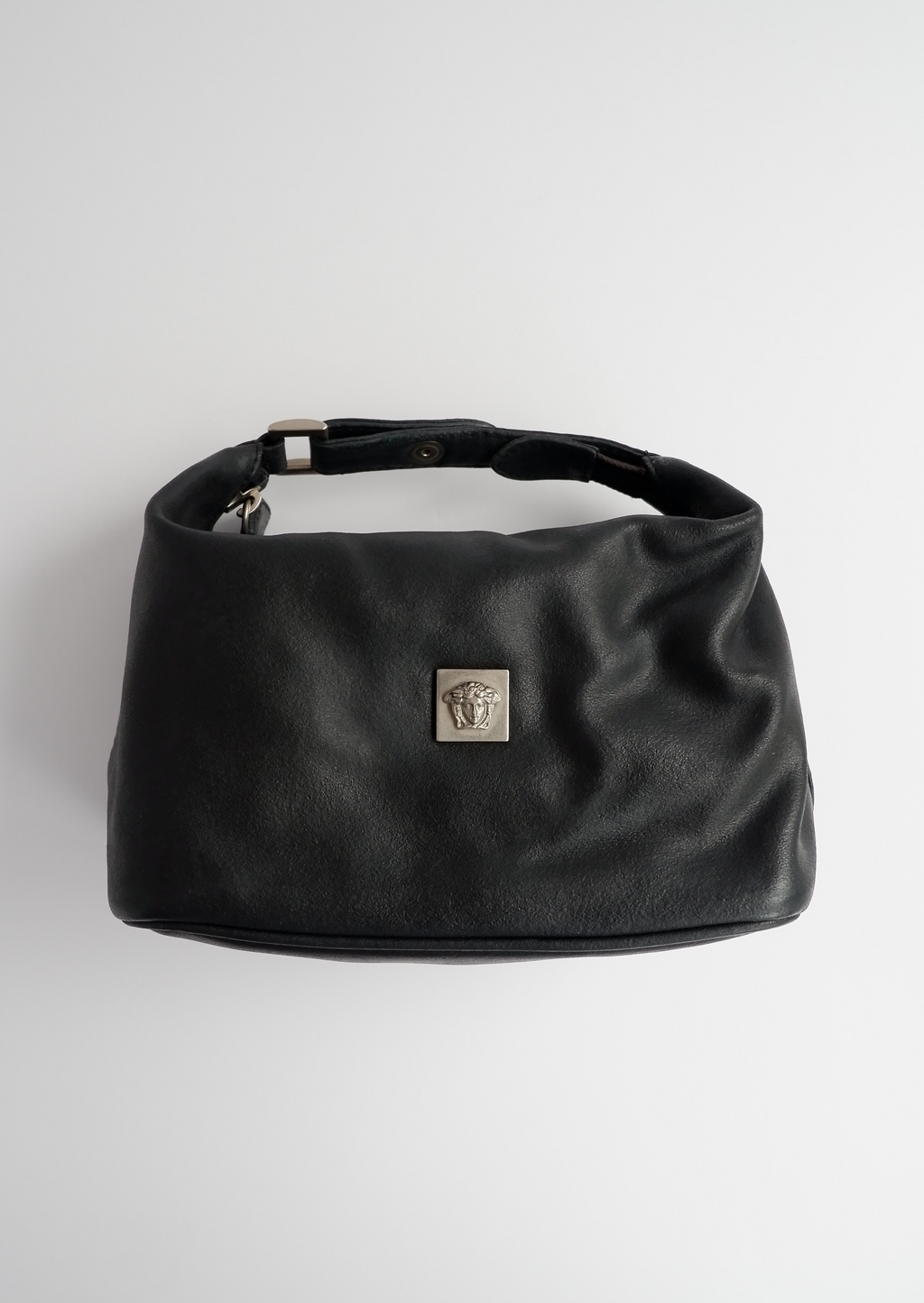 Authentique pochette micro en cuir Versace d'occasion avec poignée supérieure