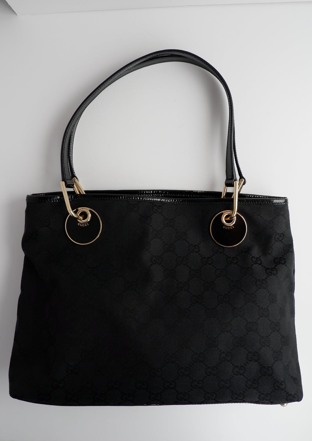 Authentique sac cabas Gucci d'occasion en toile GG noire