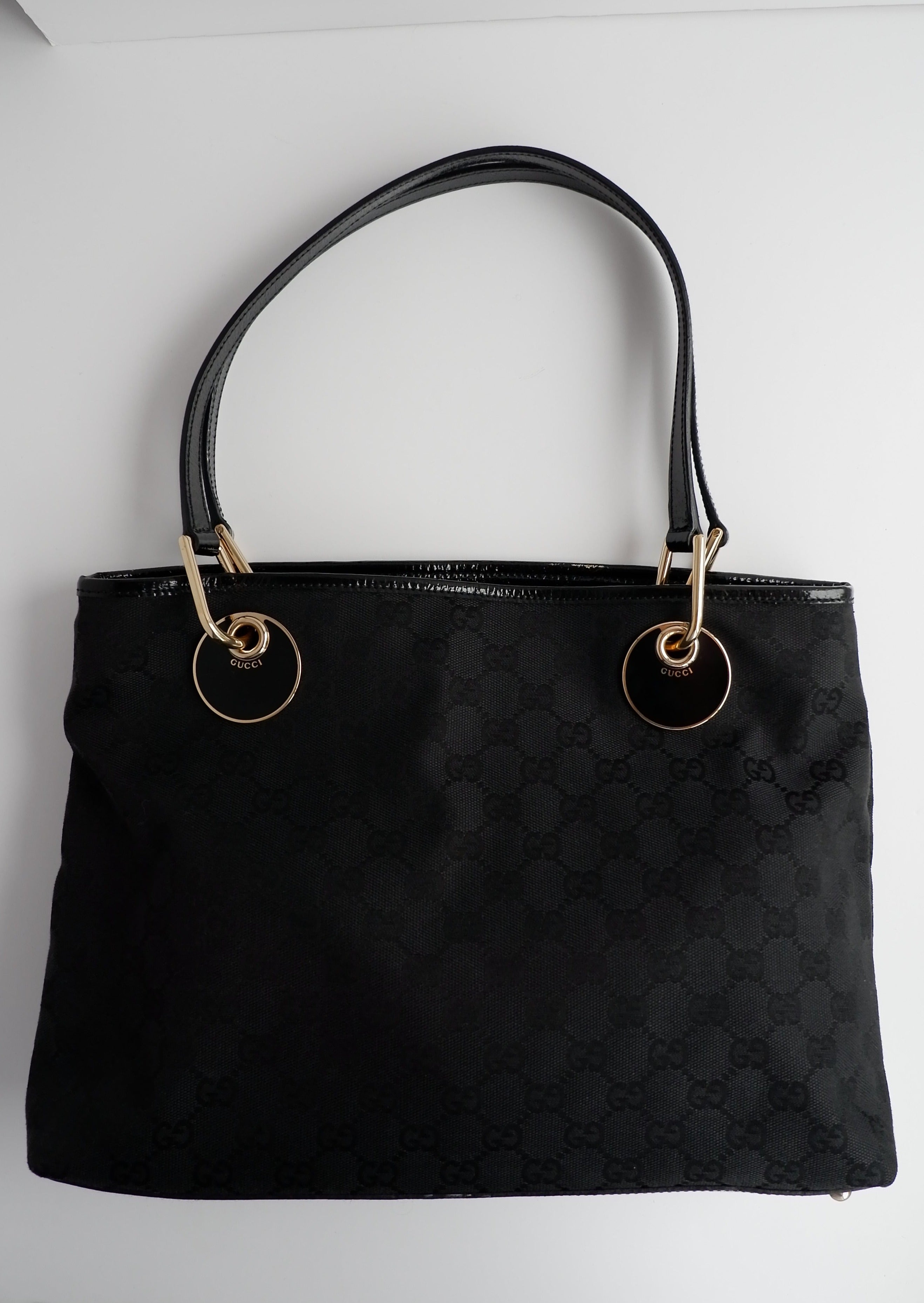 Authentique sac cabas Gucci d'occasion en toile GG noire