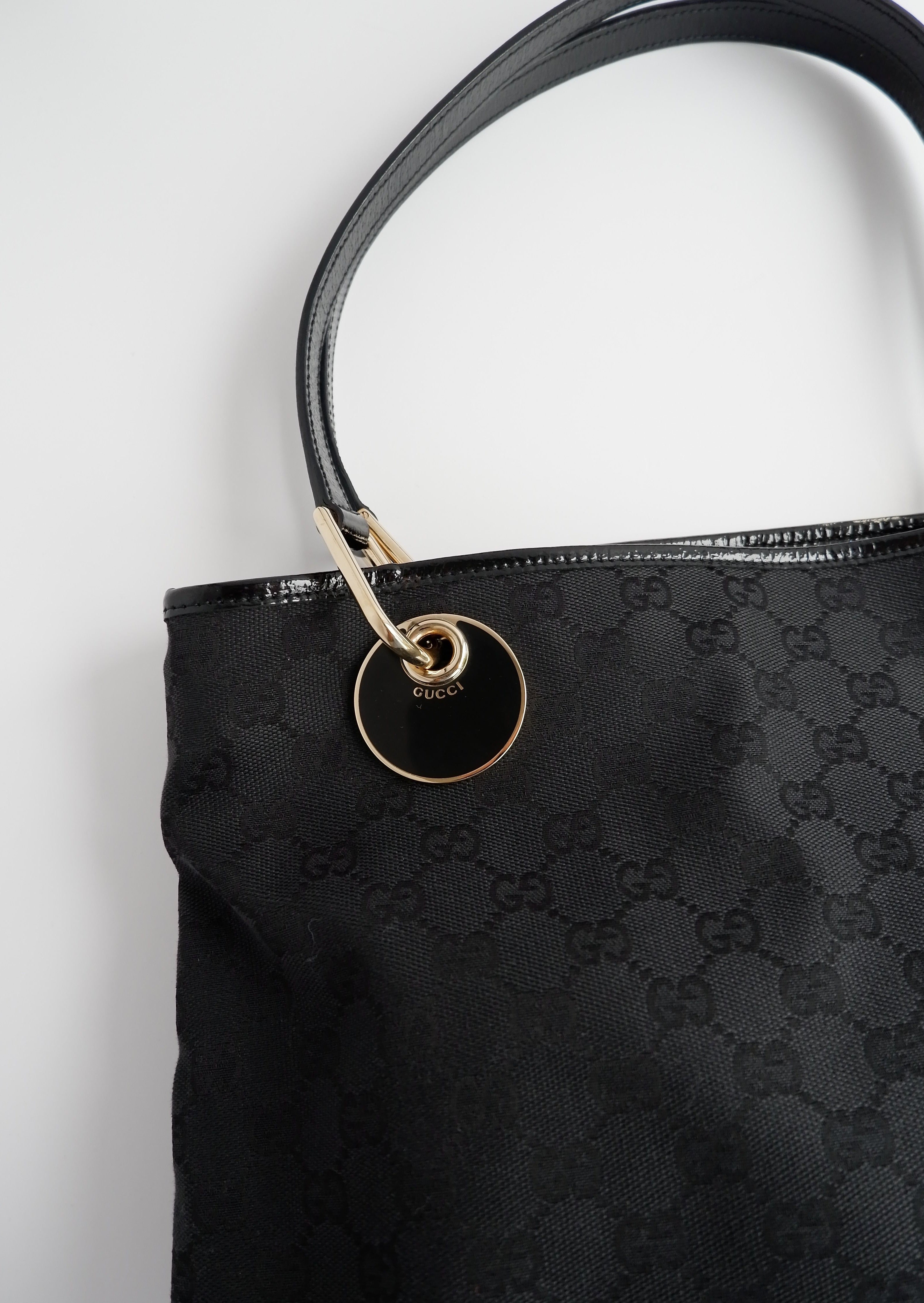 Authentique sac cabas Gucci d'occasion en toile GG noire