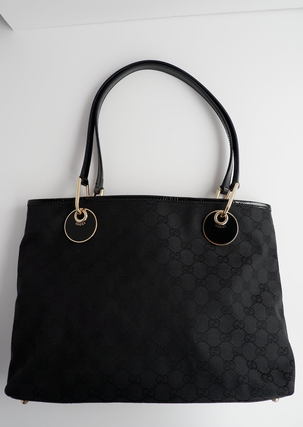 Authentique sac cabas Gucci d'occasion en toile GG noire