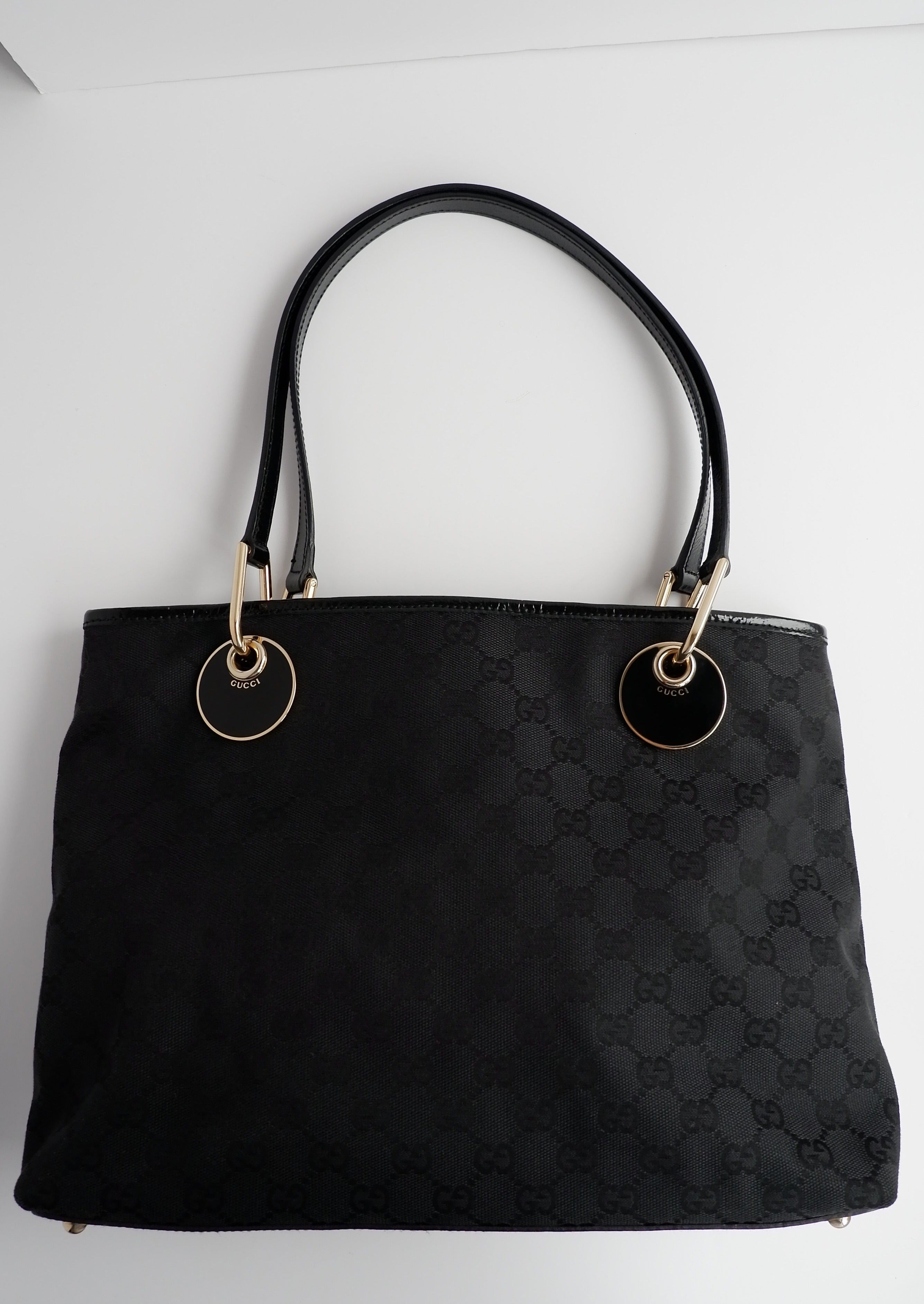 Authentique sac cabas Gucci d'occasion en toile GG noire