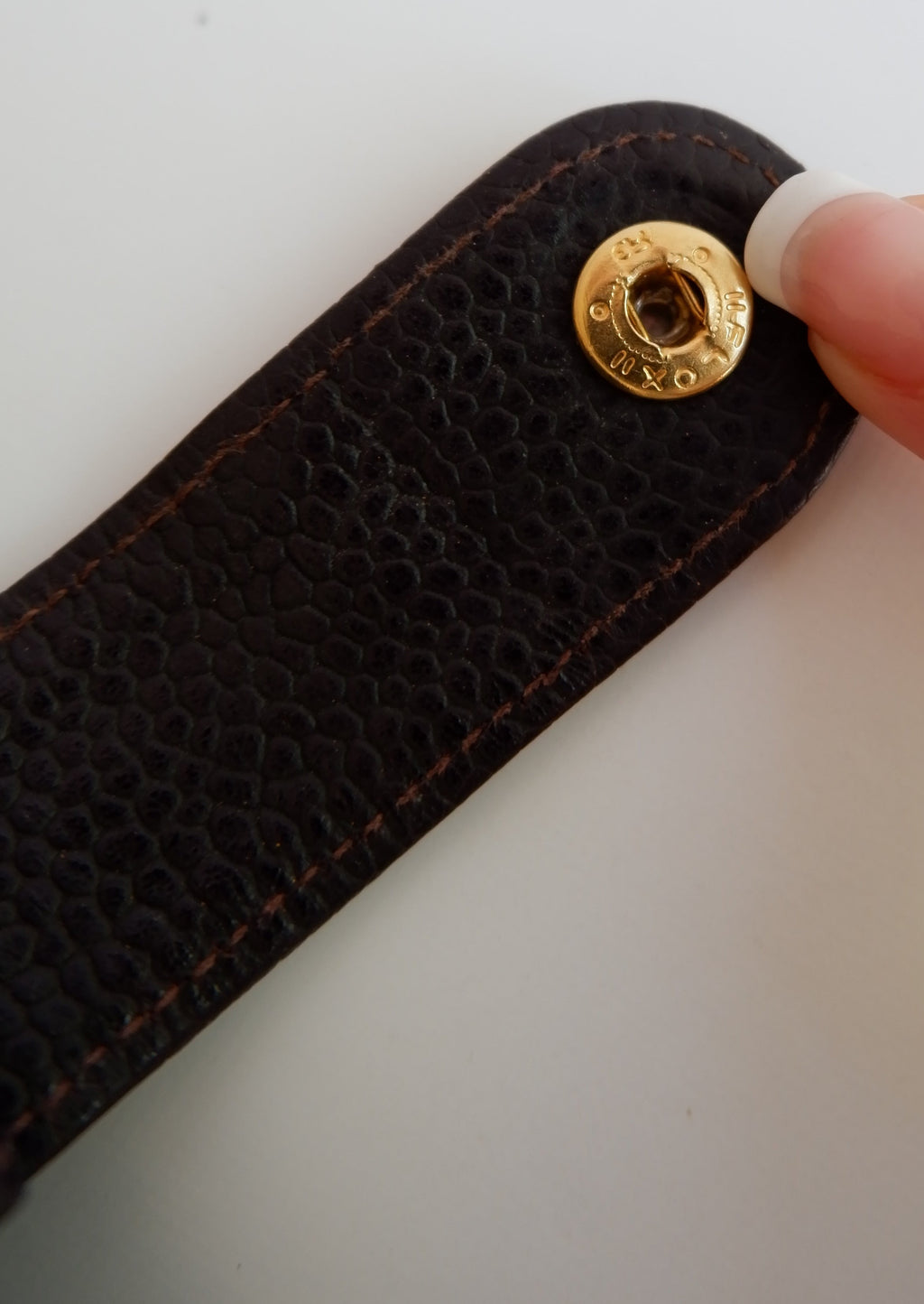 Authentique protège-agenda Chanel en cuir grainé caviar marron, d'occasion