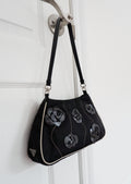 Authentique Sac bandoulière Prada noir et blanc en nylon avec détails roses d'occasion