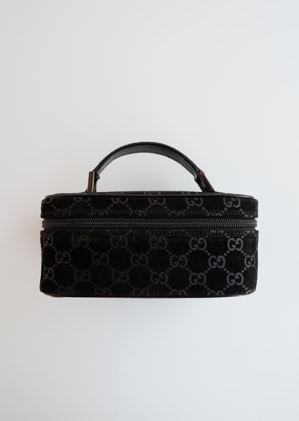 Authentique sac vanity Gucci en daim noir imprimé GG, d'occasion