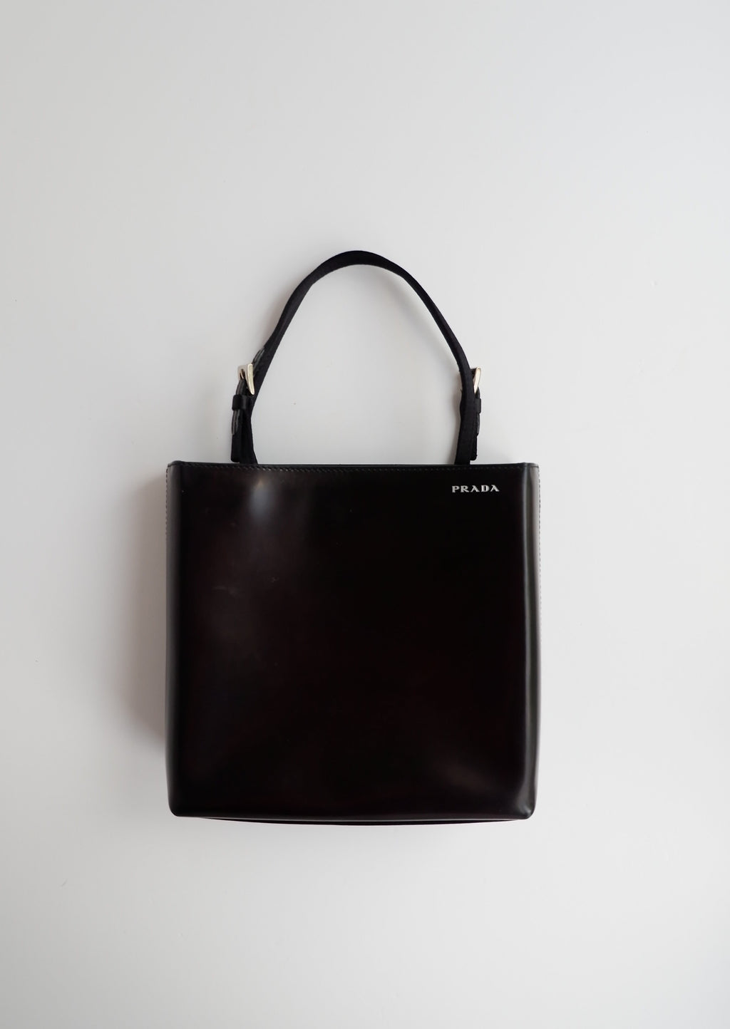 Sac/cabas micro Prada authentique d'occasion en cuir verni noir