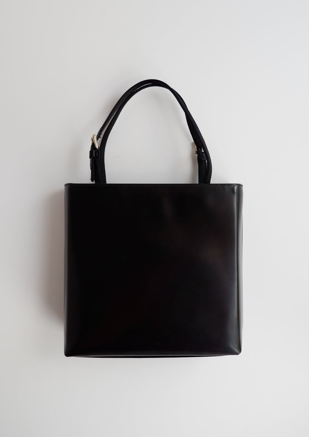 Sac/cabas micro Prada authentique d'occasion en cuir verni noir