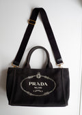 Sac bandoulière / cabas Prada Canapa en toile noire, authentique et d'occasion