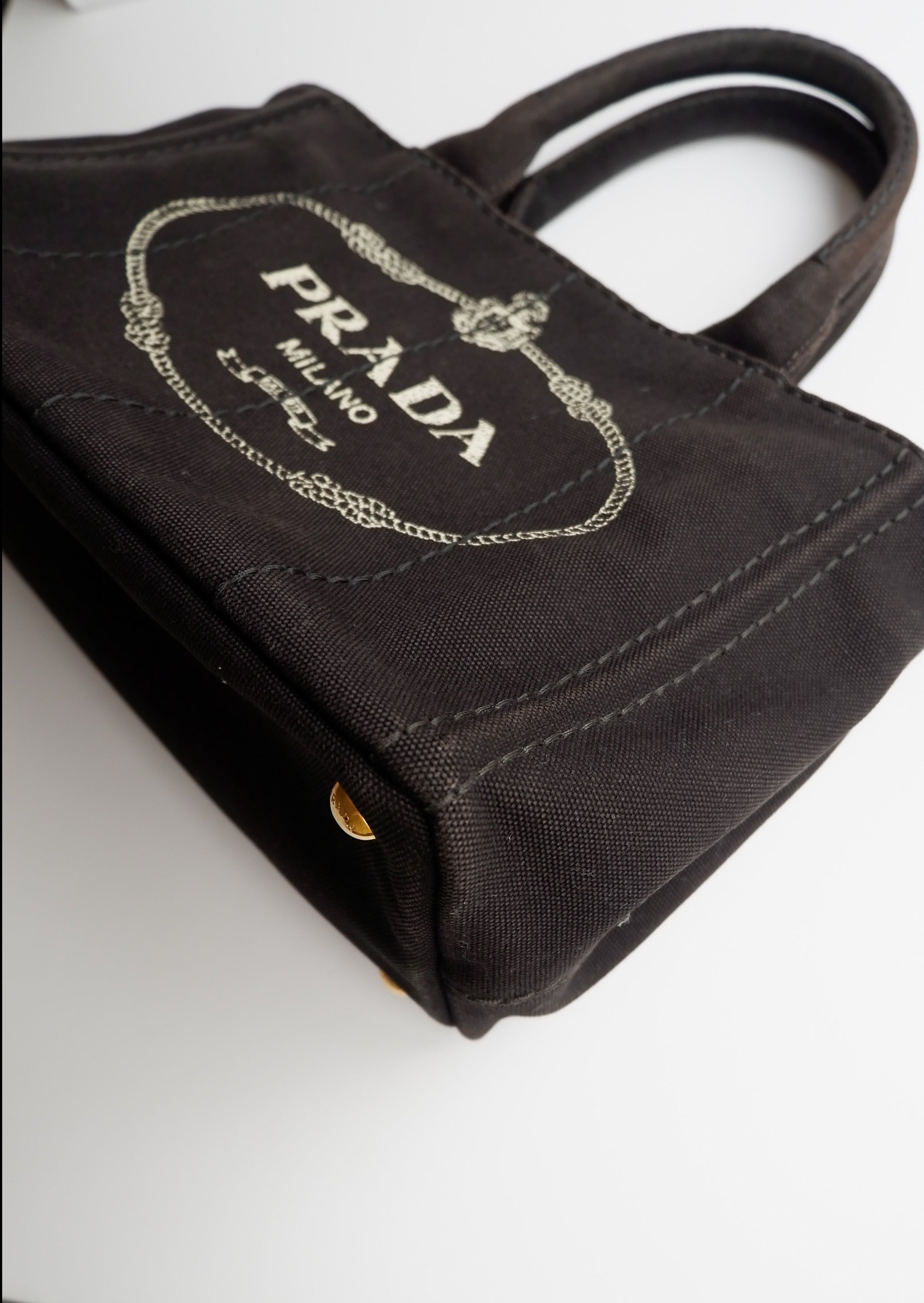 Sac bandoulière / cabas Prada Canapa en toile noire, authentique et d'occasion