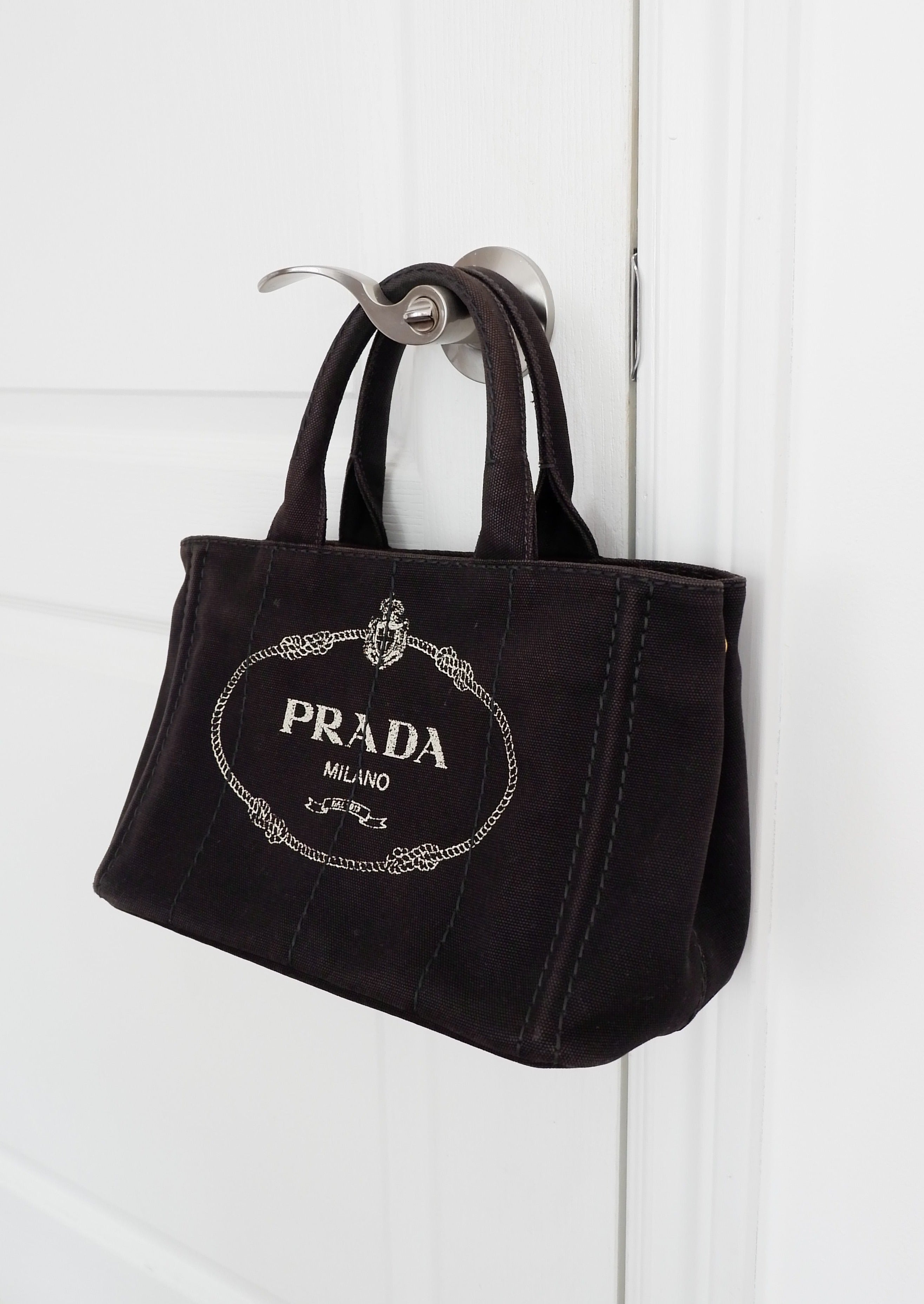 Sac bandoulière / cabas Prada Canapa en toile noire, authentique et d'occasion