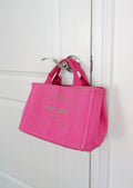 Sac cabas Prada Canapa en toile rose authentique d'occasion