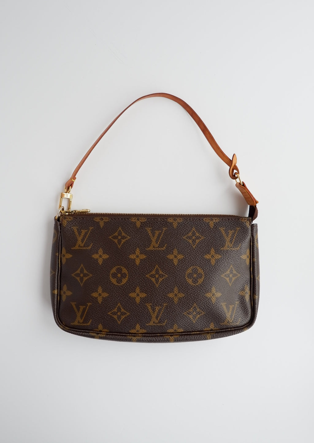 Sac à accessoires Pochette Monogram Louis Vuitton d'occasion authentique