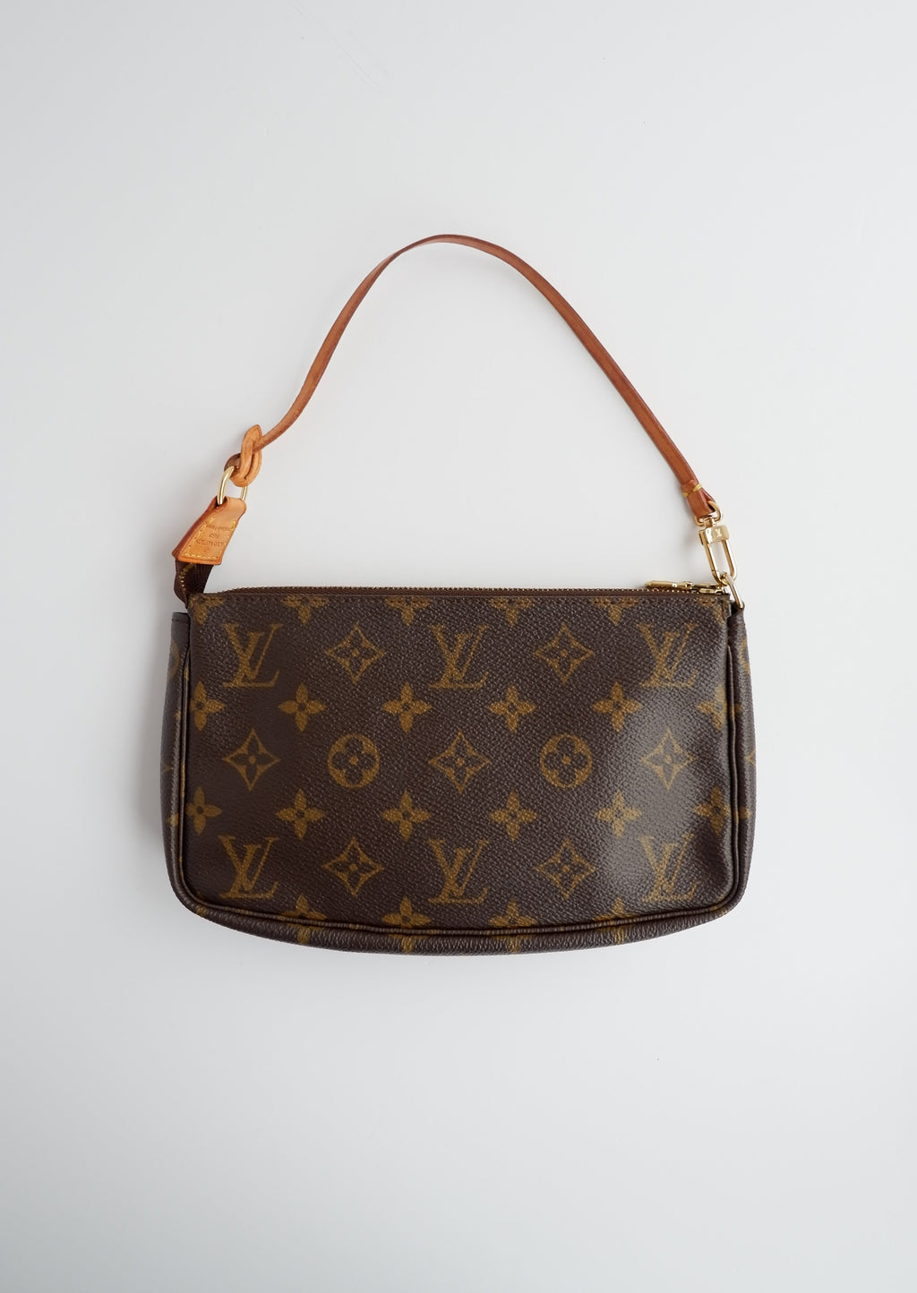 Sac à accessoires Pochette Monogram Louis Vuitton d'occasion authentique
