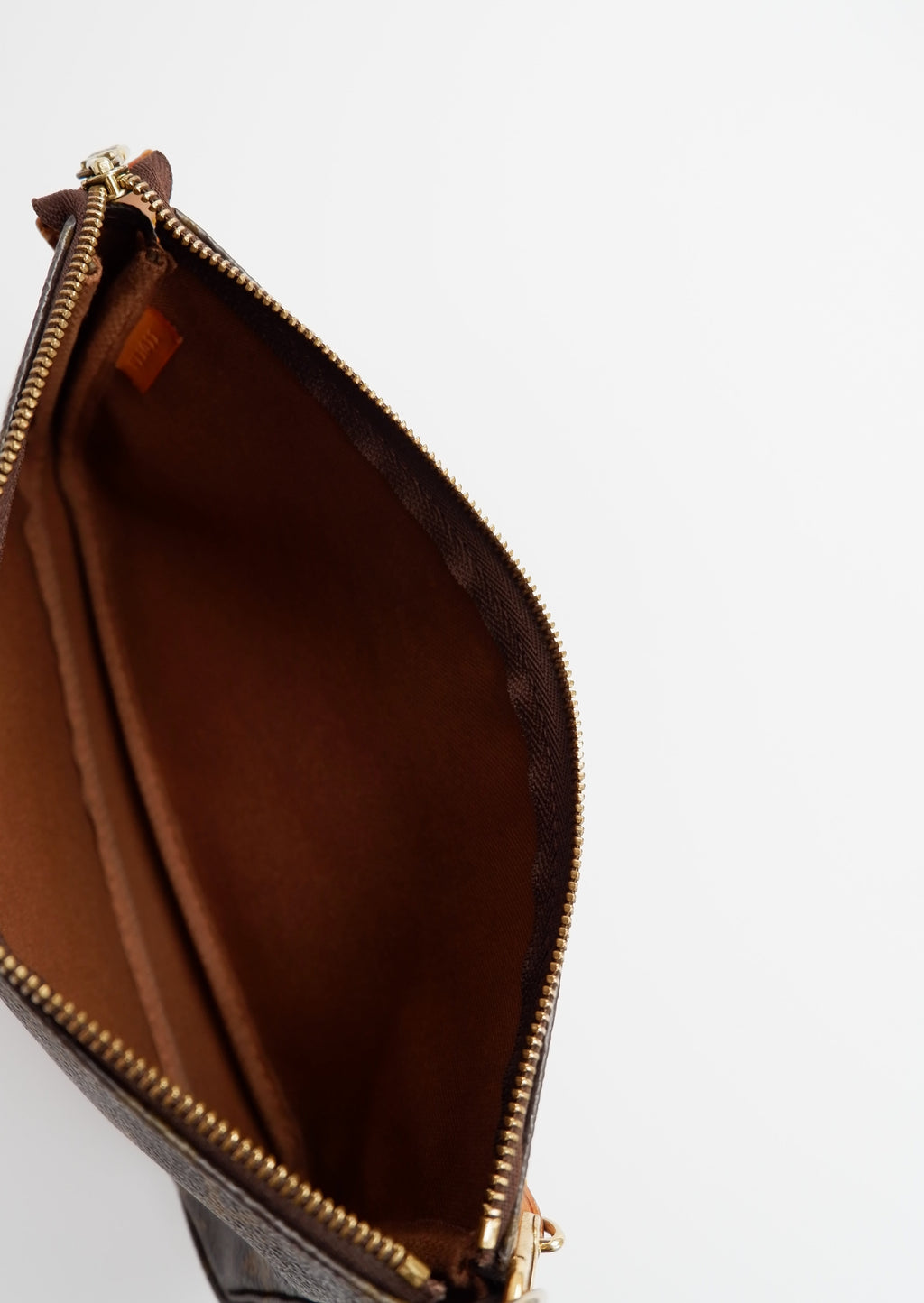 Sac à accessoires Pochette Monogram Louis Vuitton d'occasion authentique