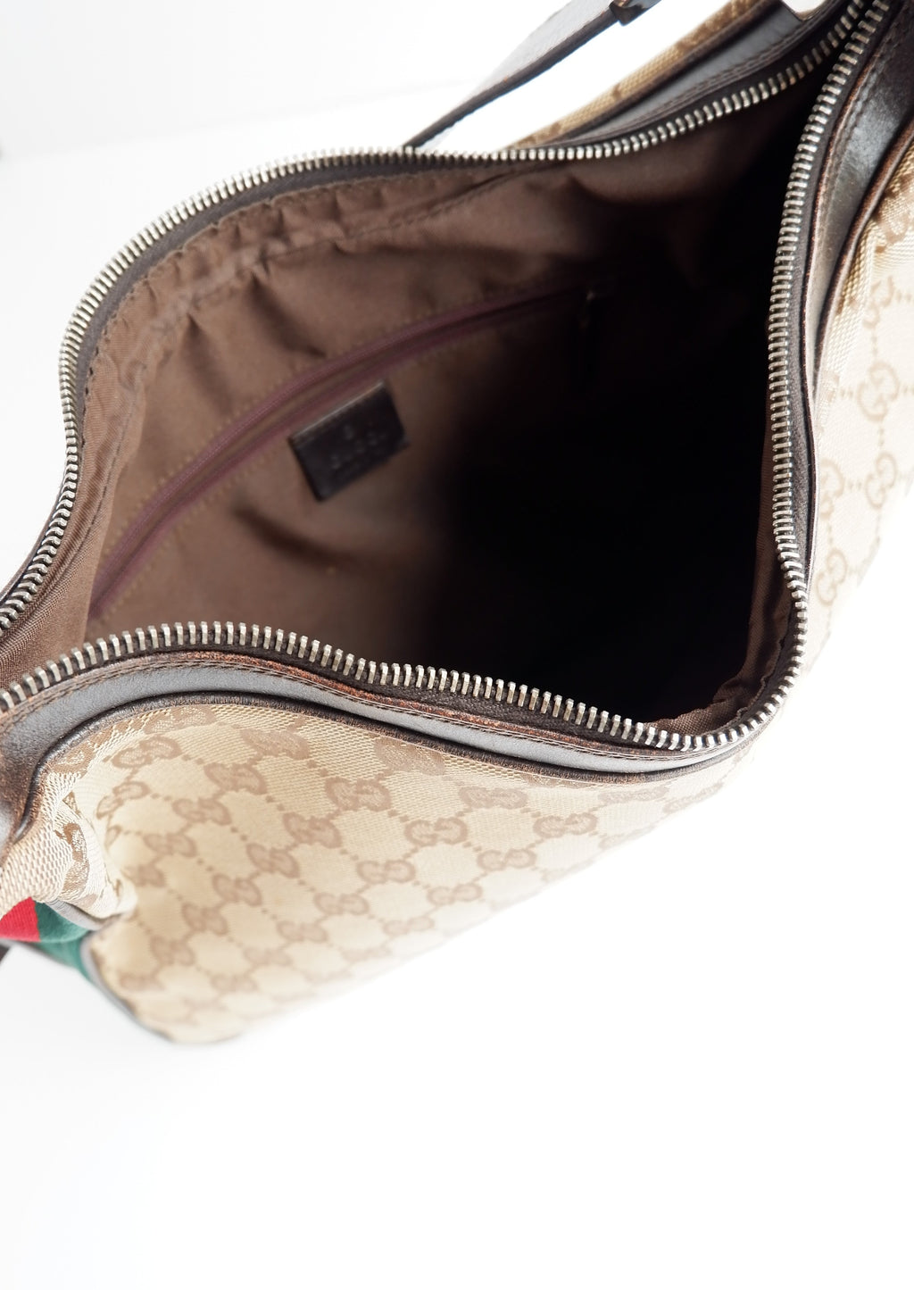 Authentique sac bandoulière Gucci d'occasion avec imprimé GG et bande Web