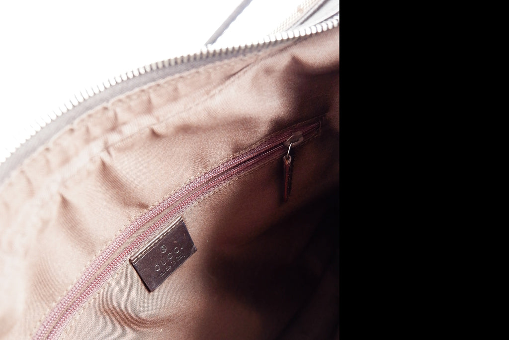 Authentique sac bandoulière Gucci d'occasion avec imprimé GG et bande Web