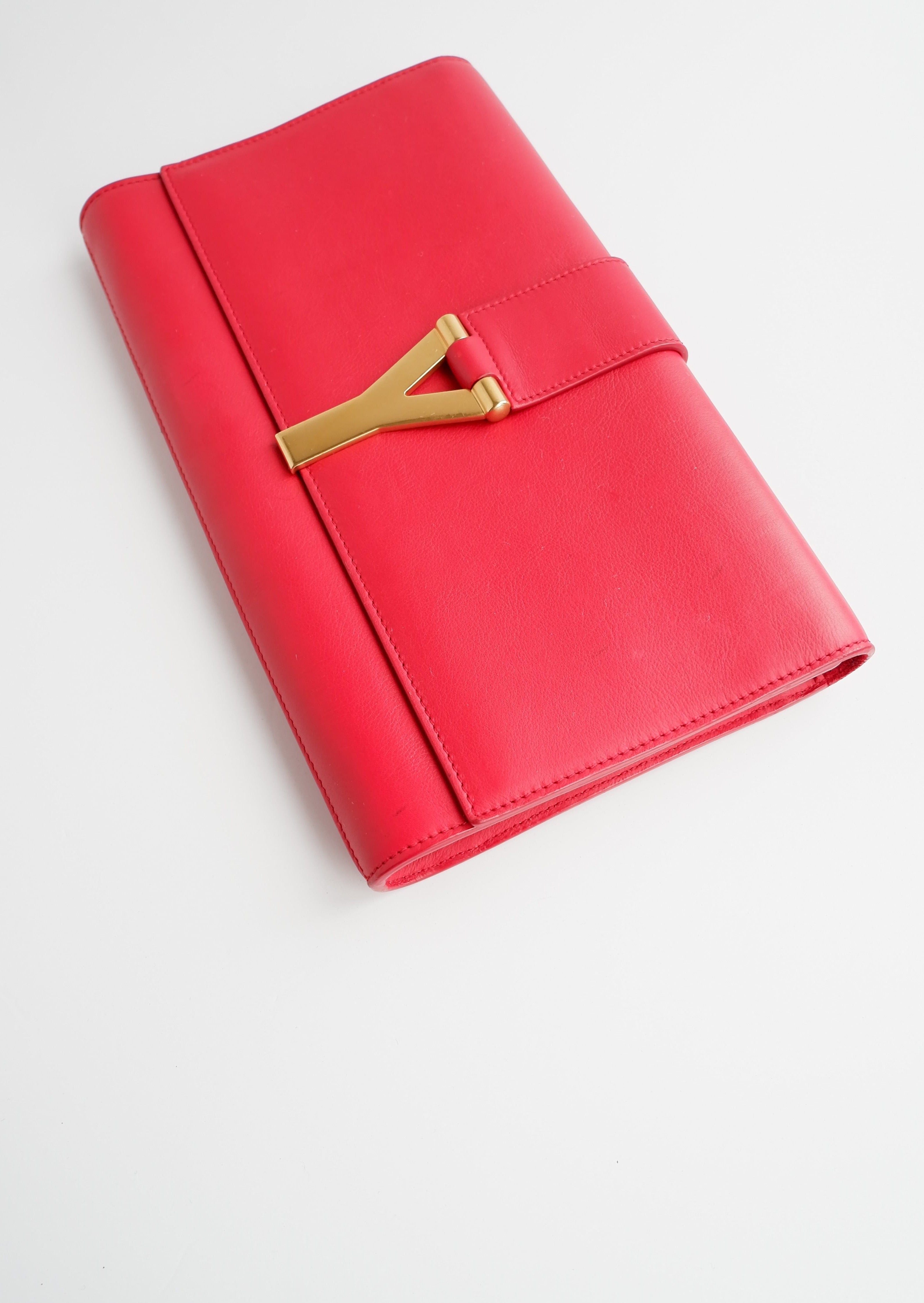 Pochette Saint Laurent authentique d'occasion en cuir rouge