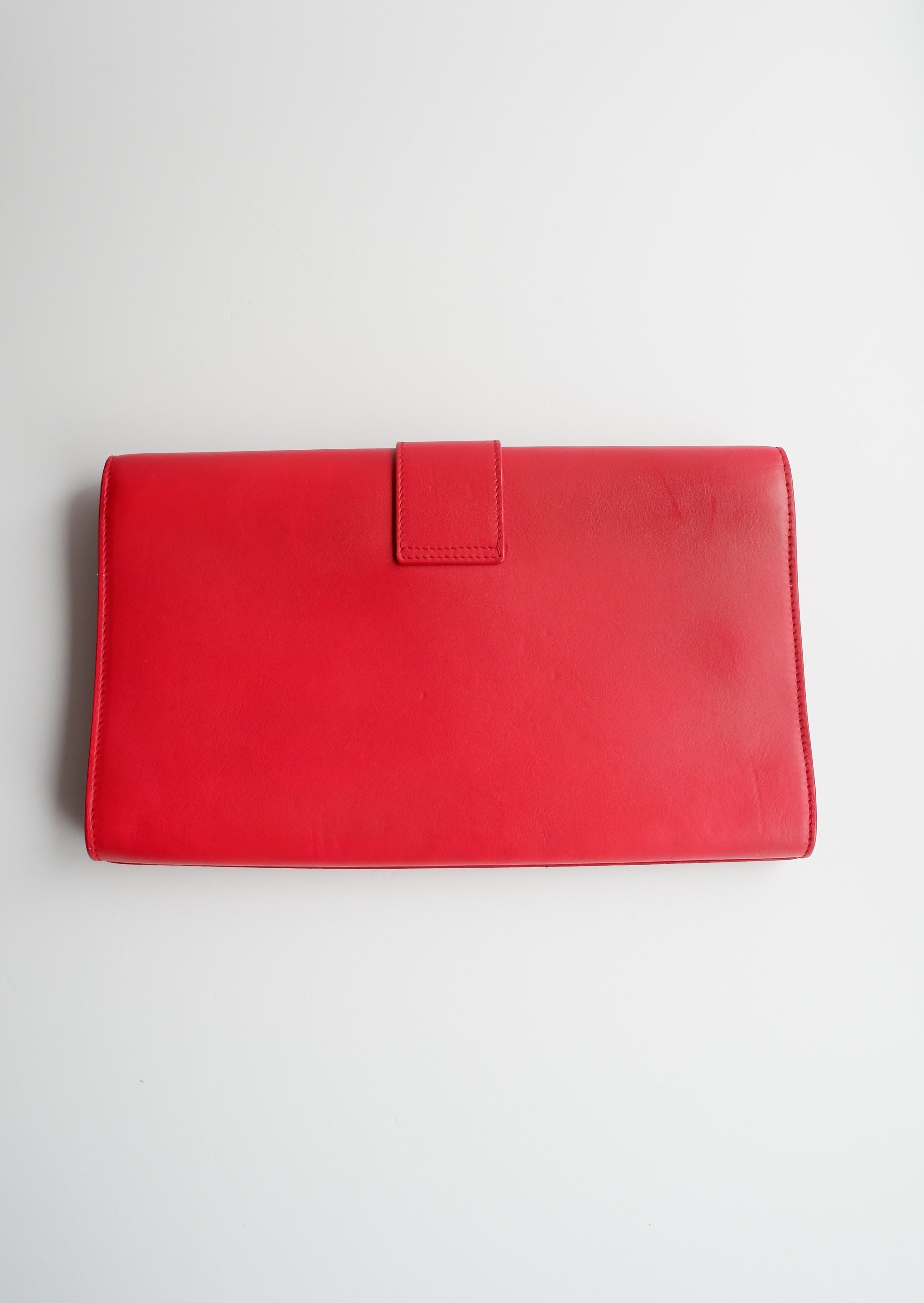 Pochette Saint Laurent authentique d'occasion en cuir rouge