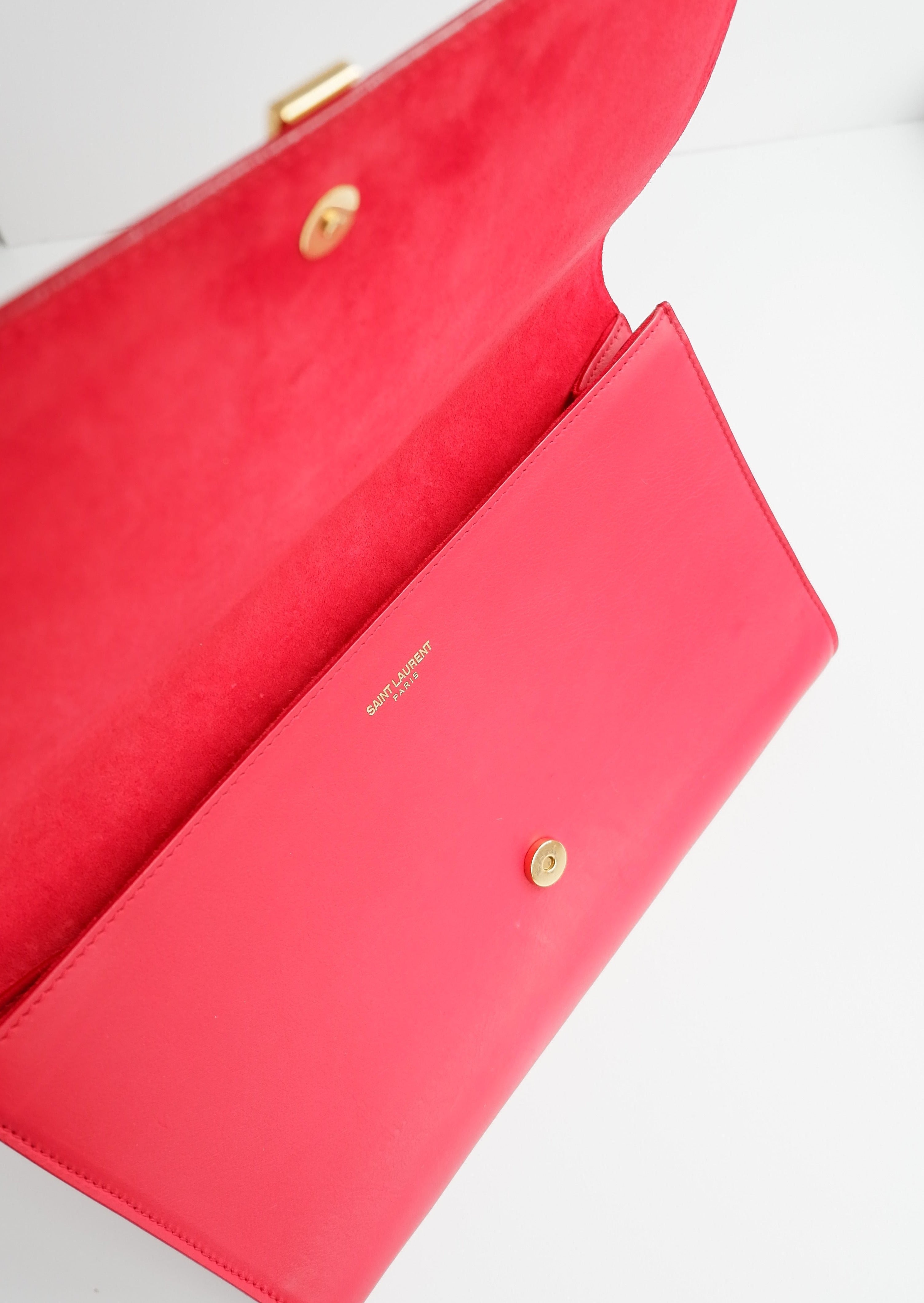Pochette Saint Laurent authentique d'occasion en cuir rouge
