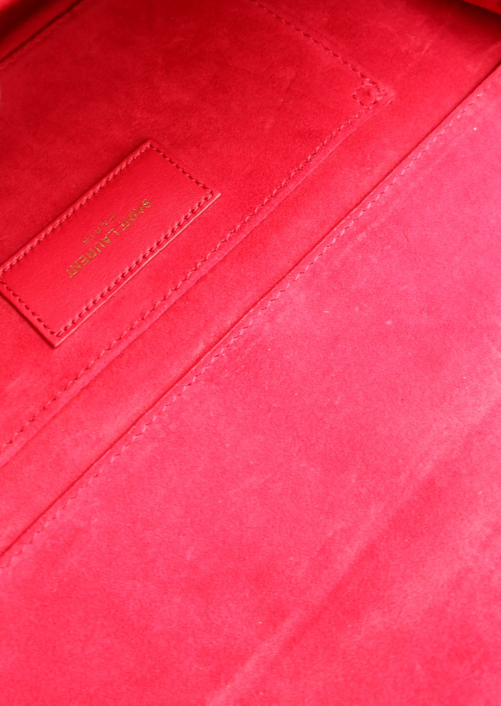 Pochette Saint Laurent authentique d'occasion en cuir rouge