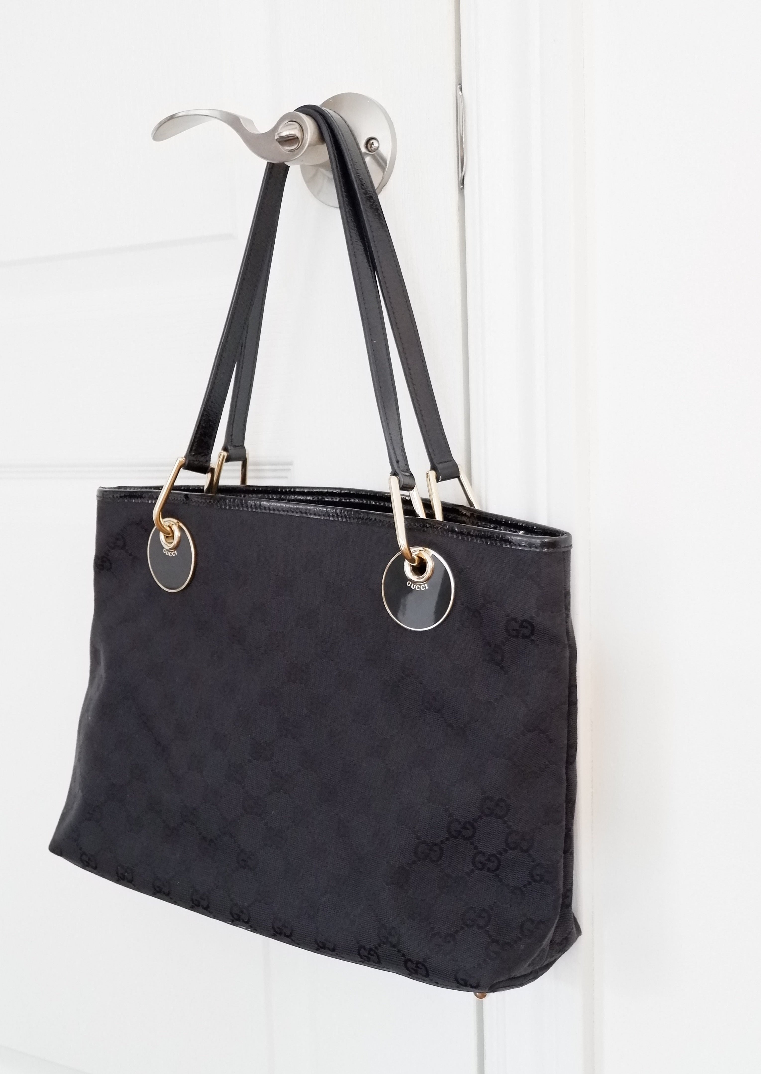 Authentique sac cabas Gucci d'occasion en toile GG noire