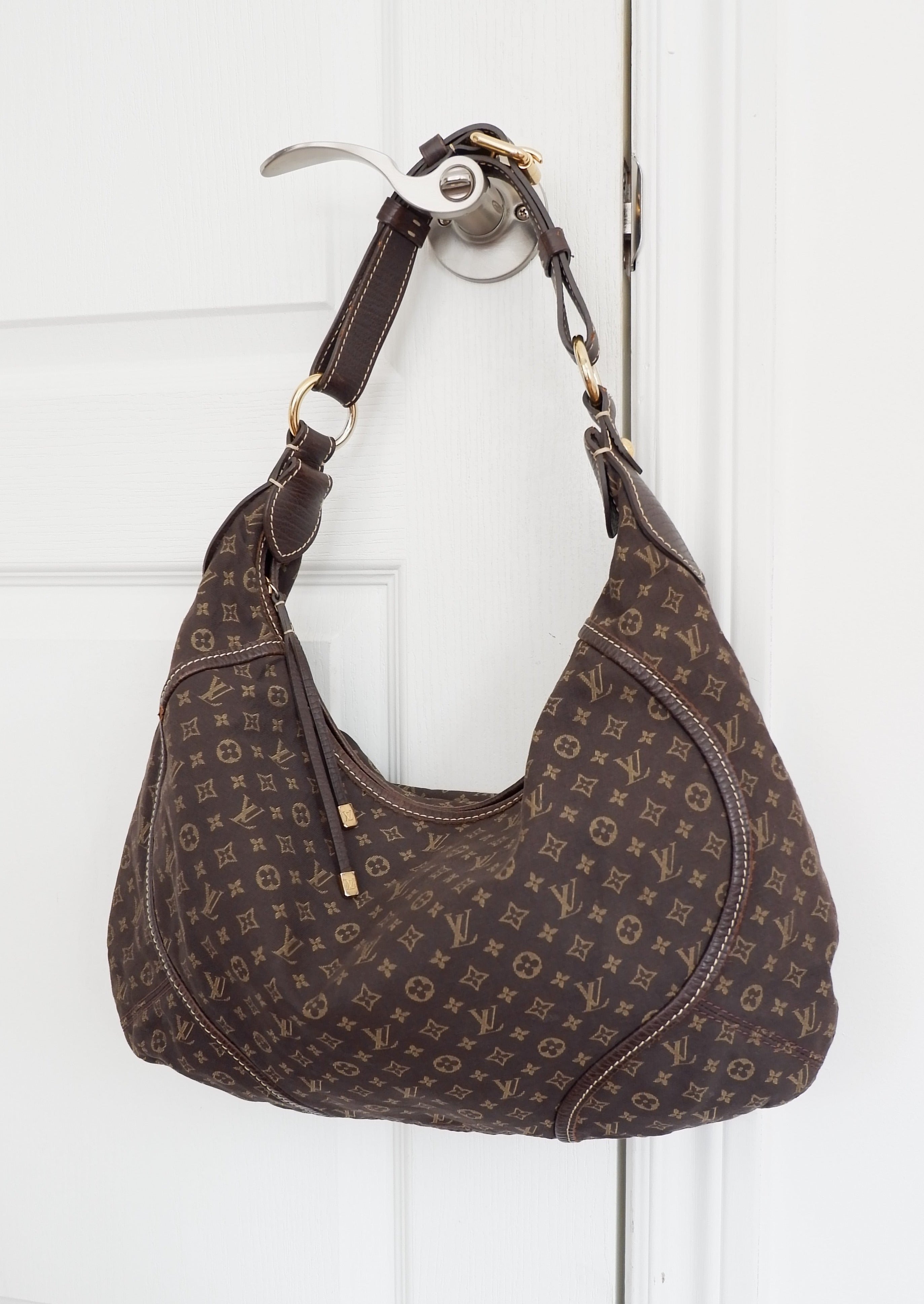 Authentique Sac bandoulière Louis Vuitton Mini Lin Manon PM Ébène d'occasion