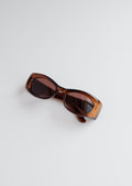 Authentiques lunettes de soleil Gucci d'occasion marron avec logo GG et monture carrée