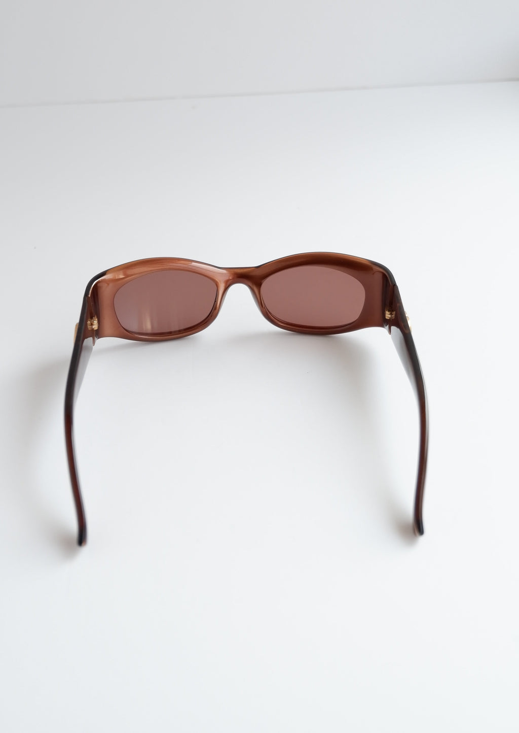 Authentiques lunettes de soleil Gucci d'occasion marron avec logo GG et monture carrée