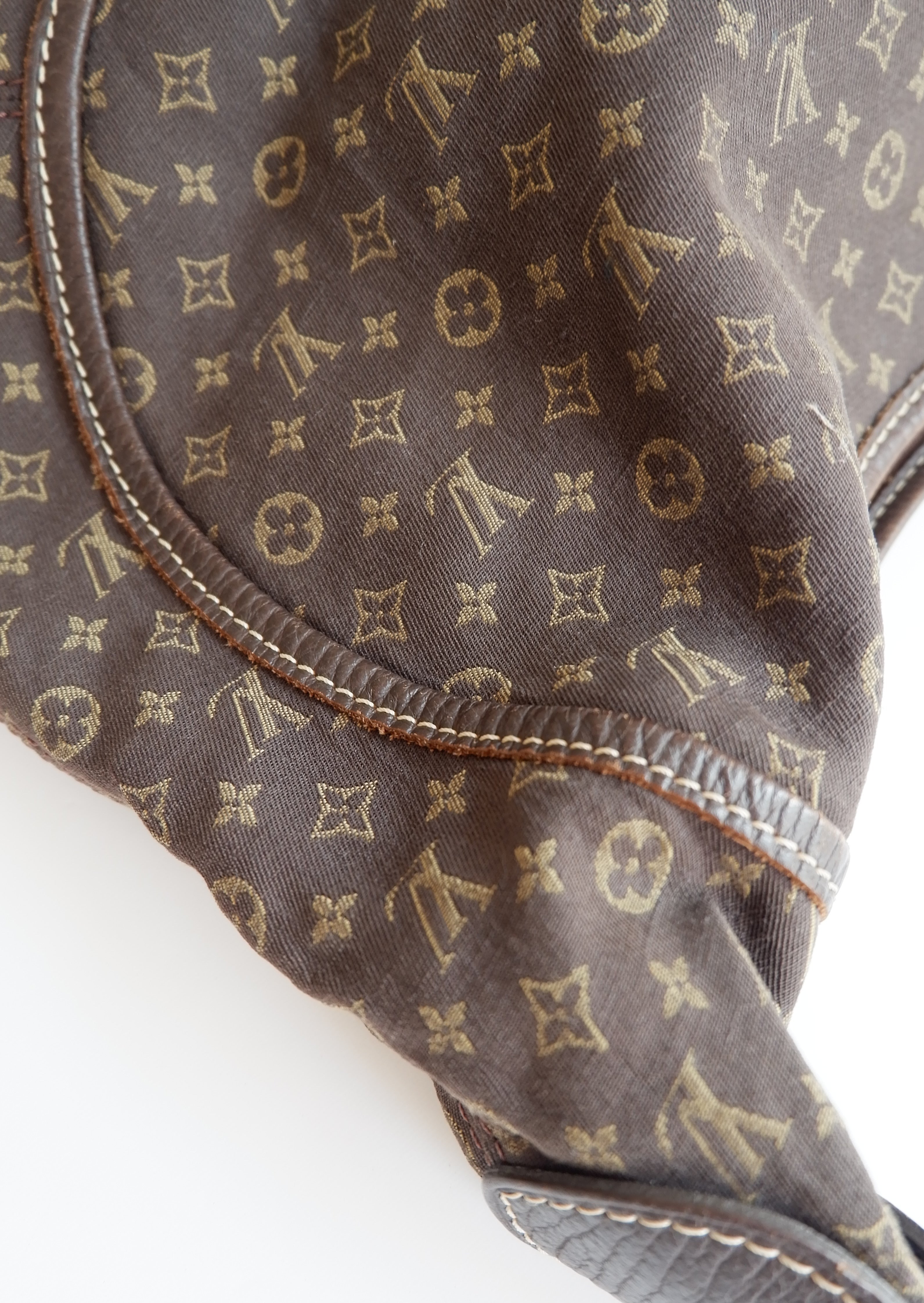 Authentique Sac bandoulière Louis Vuitton Mini Lin Manon PM Ébène d'occasion