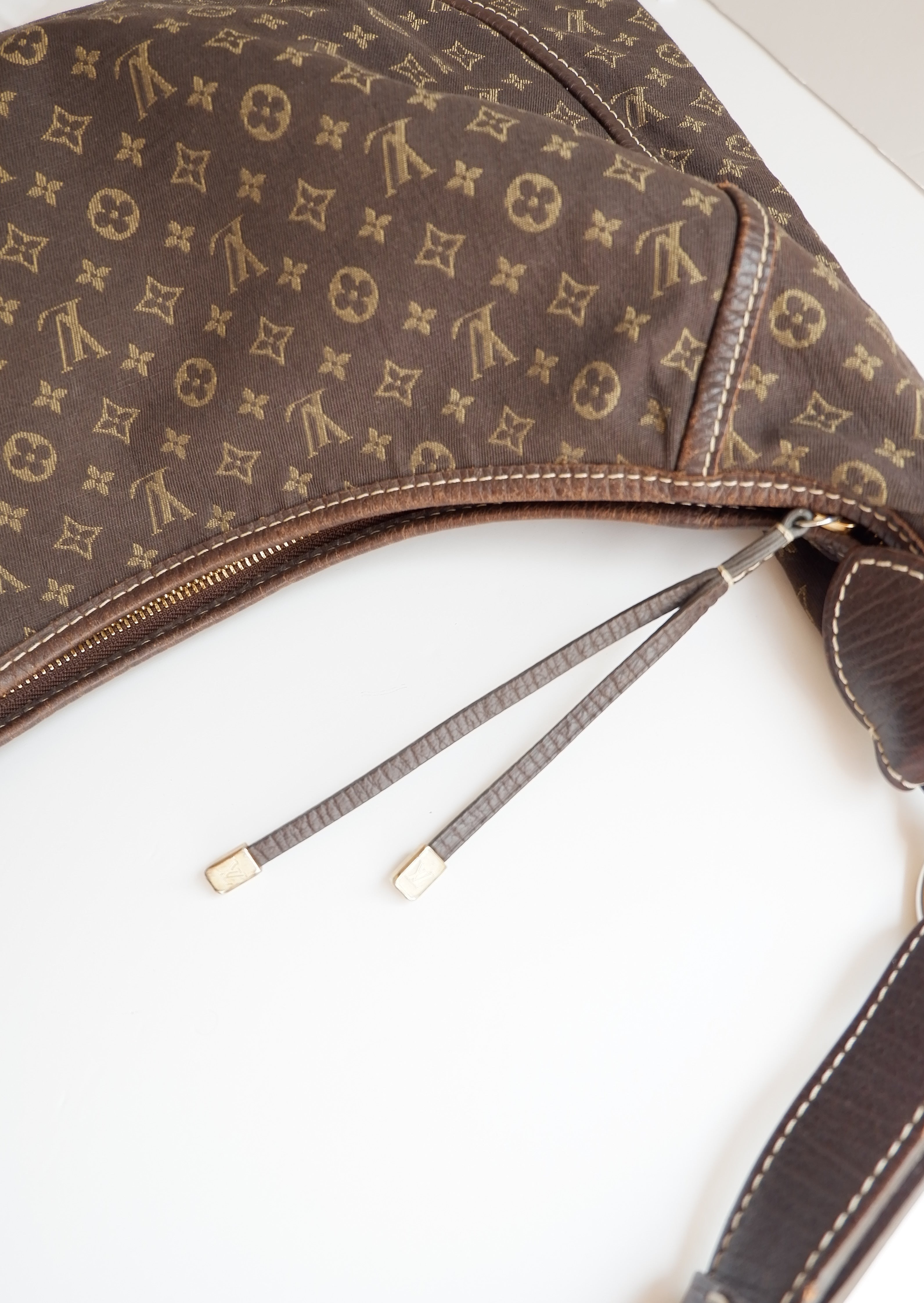 Authentique Sac bandoulière Louis Vuitton Mini Lin Manon PM Ébène d'occasion