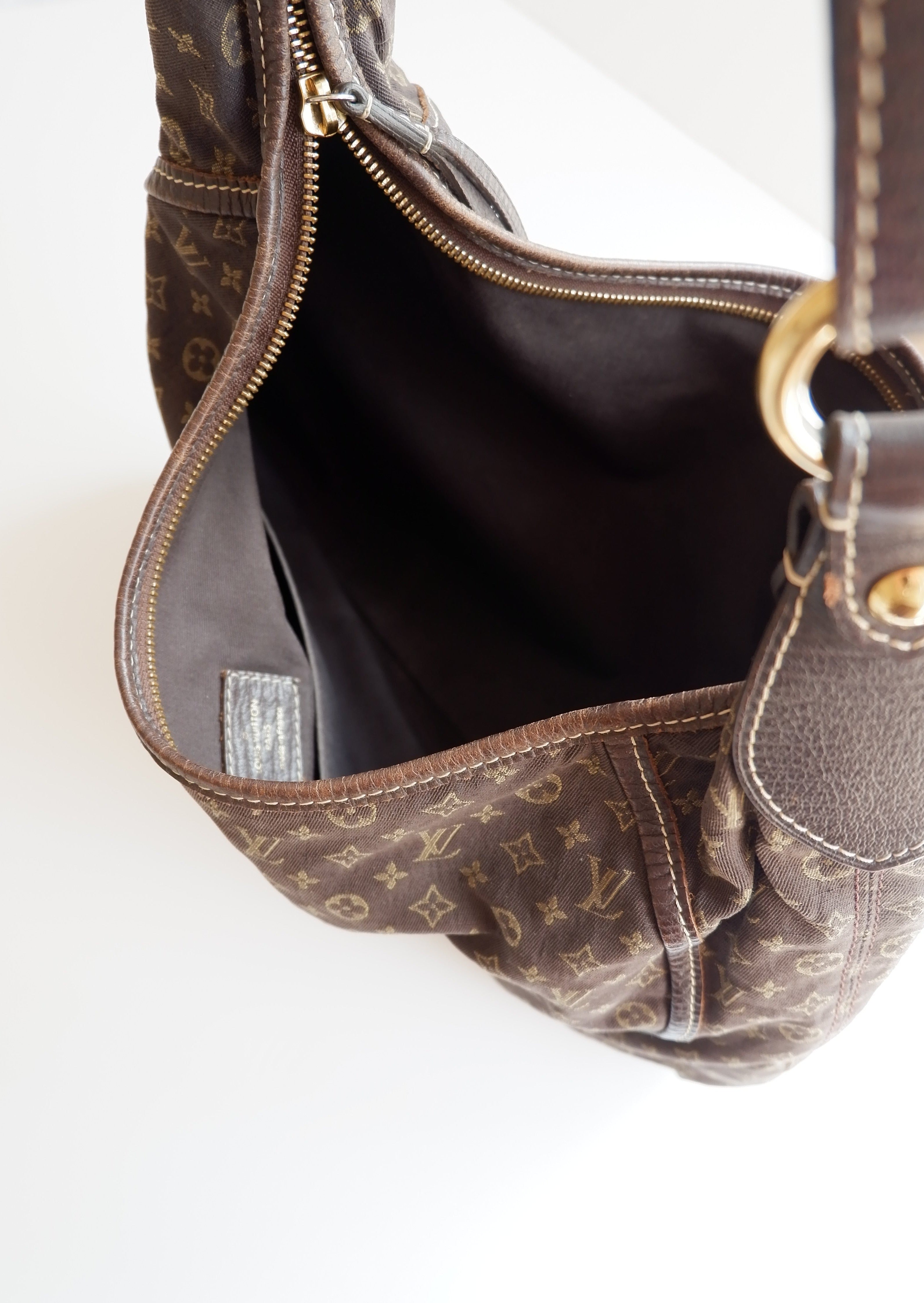Authentique Sac bandoulière Louis Vuitton Mini Lin Manon PM Ébène d'occasion