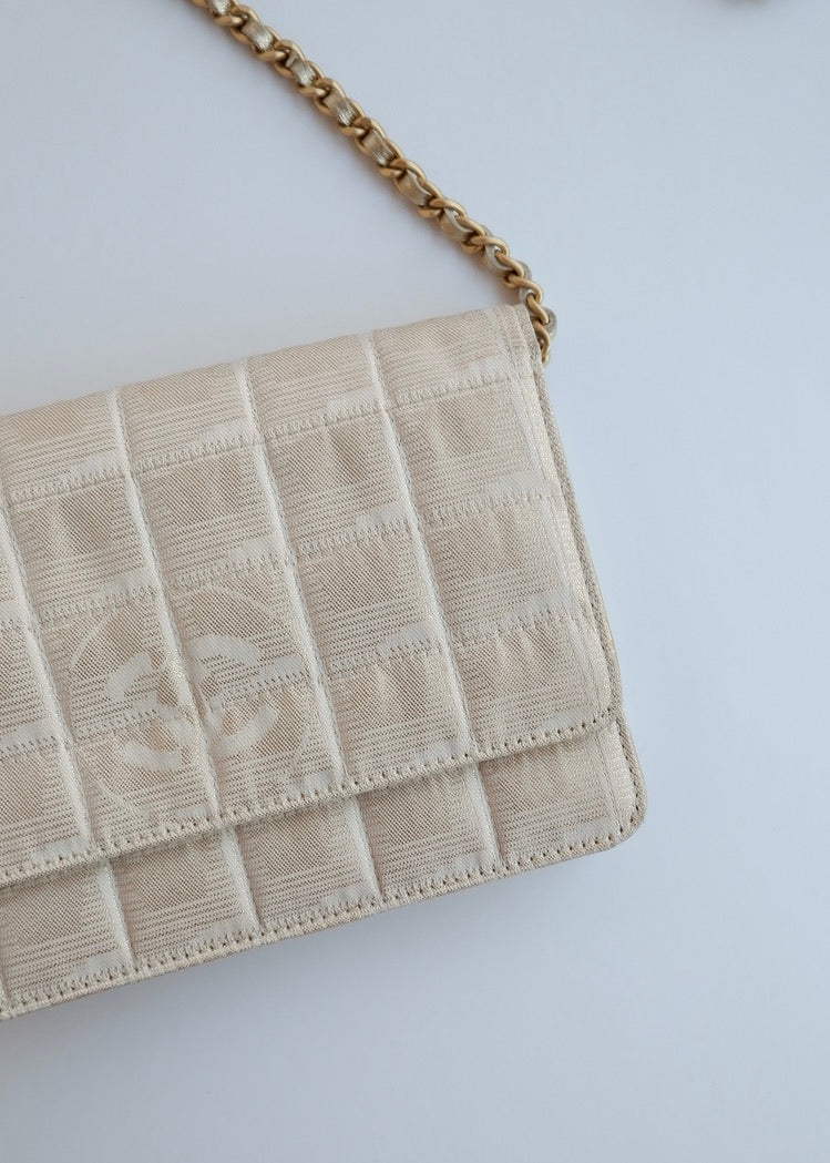 Authentic Preowned Chanel Gold Canvas New Travel Line WOC Bag