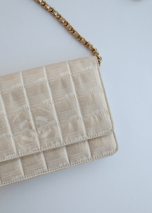 Authentic Preowned Chanel Gold Canvas New Travel Line WOC Bag