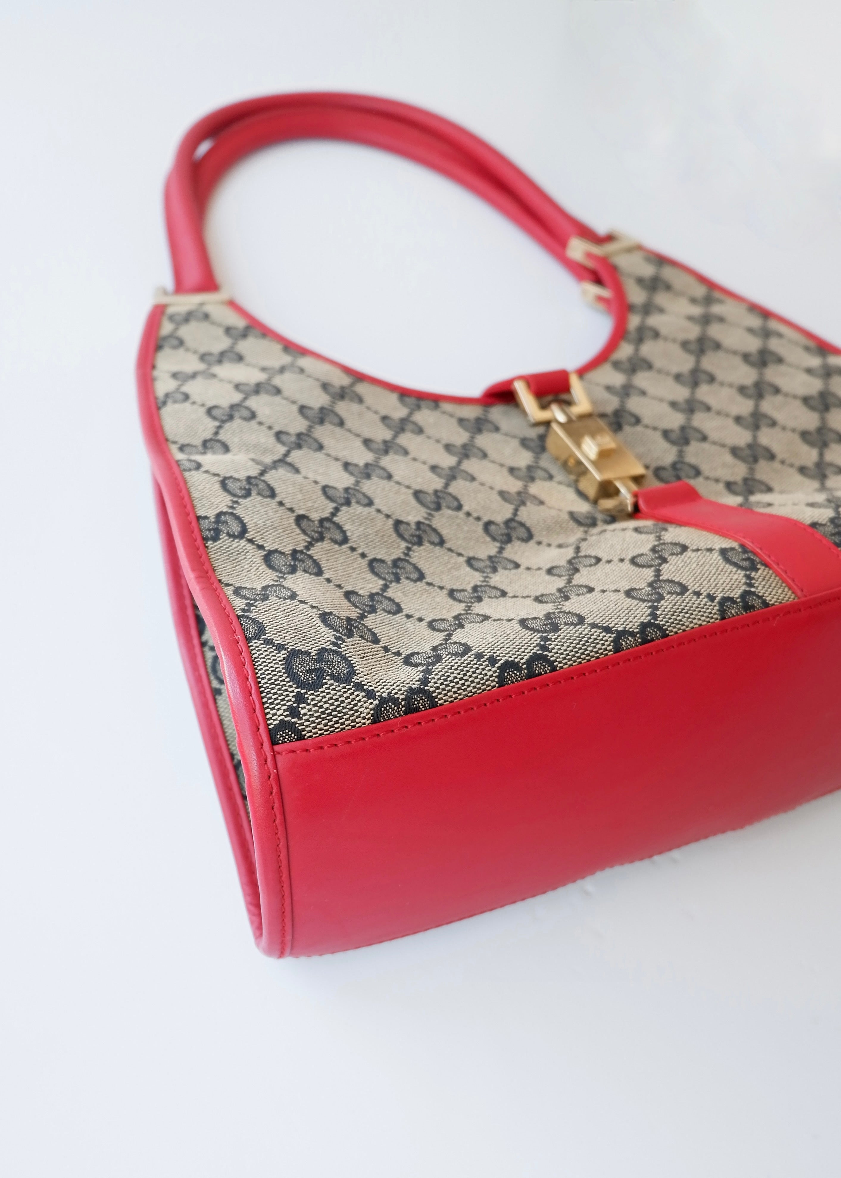 Preowned Gucci Red GG Canvas Jackie Piston Closure Shoulder Bag