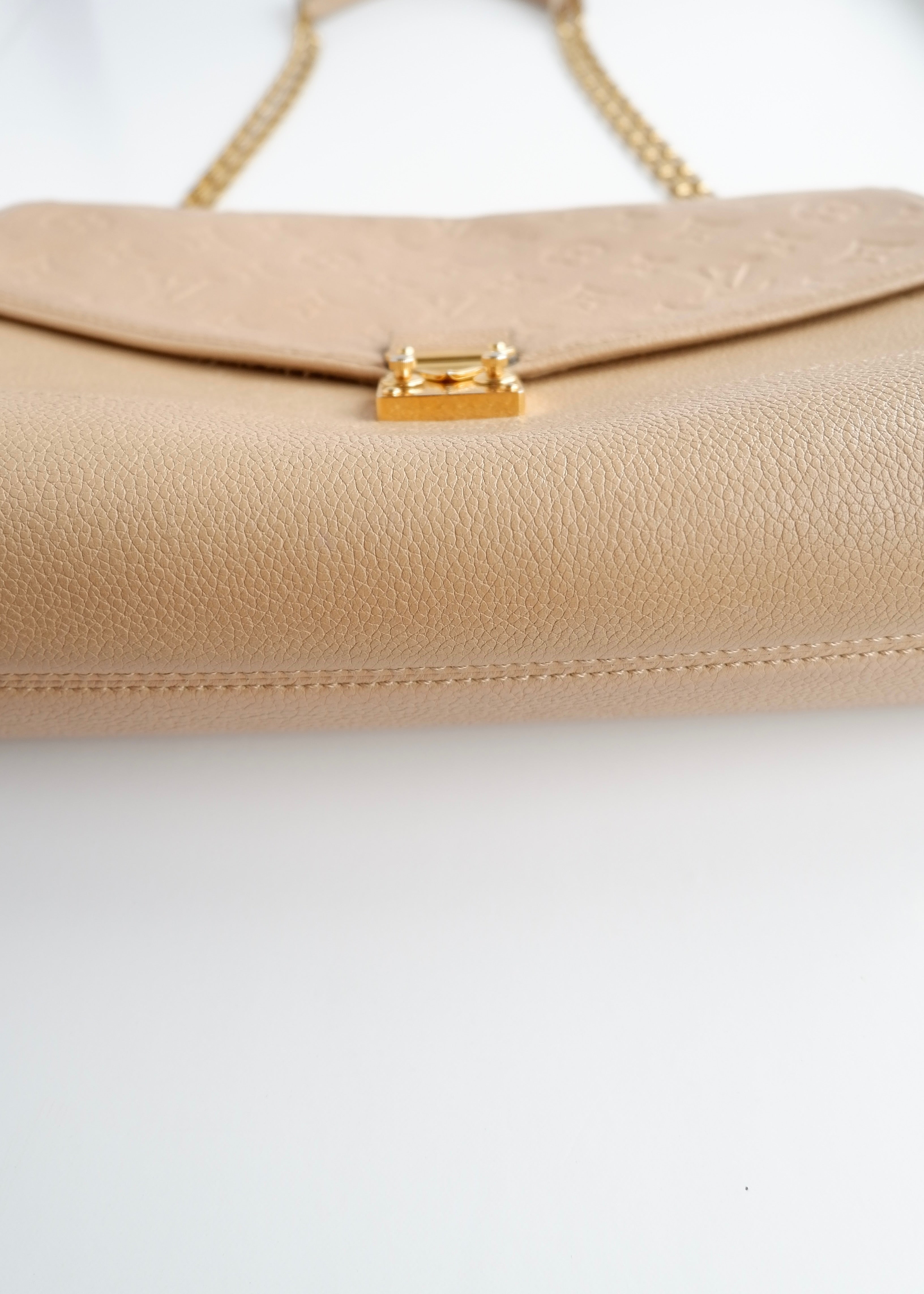 Authentic Preowned Louis Vuitton Cream Monogram Empreinte Leather St Germain MM Shoulder Bag