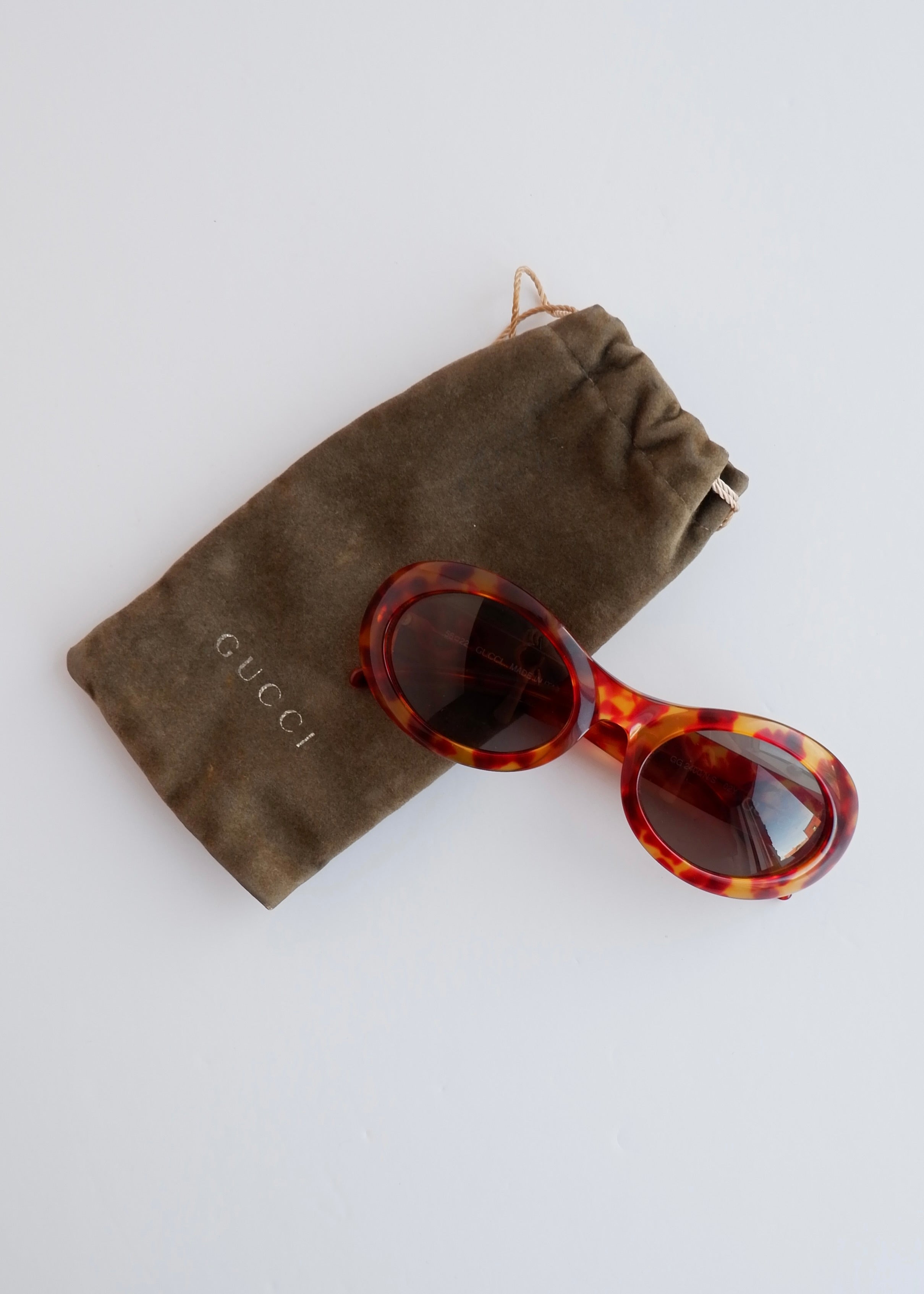 Authentiques lunettes de soleil vintage Gucci d'occasion à monture ronde écaille de tortue marron