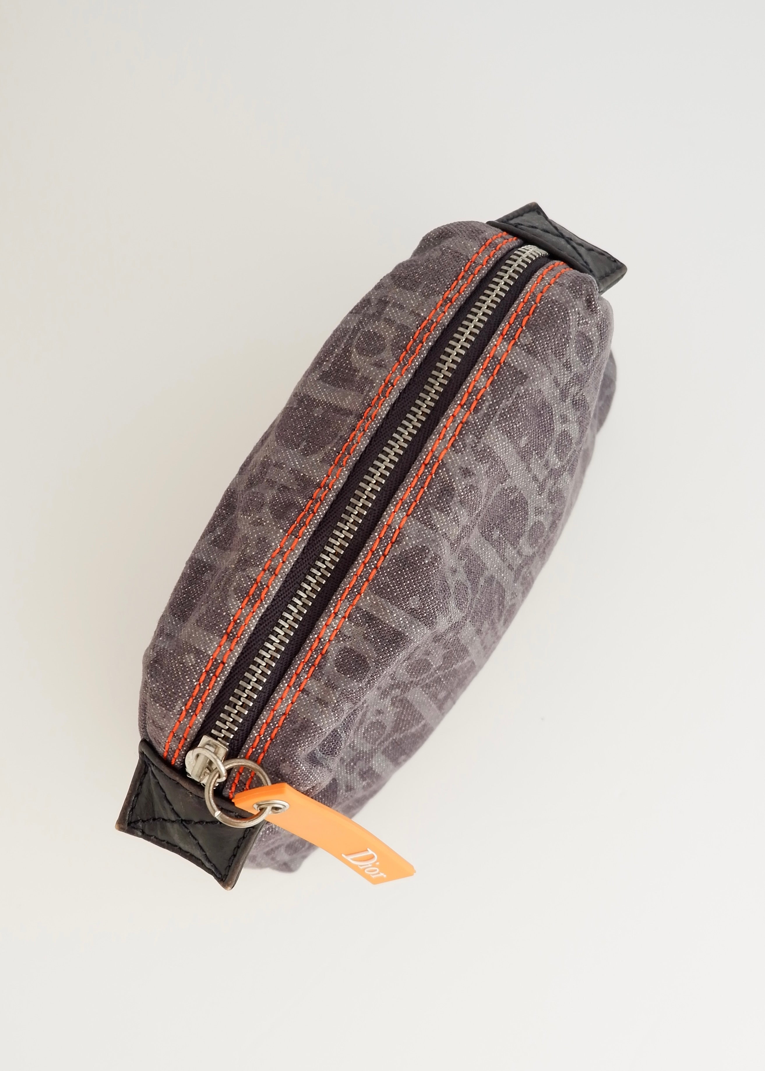 Pochette Dior en jean bleu marine motif Oblique, d'occasion et authentique