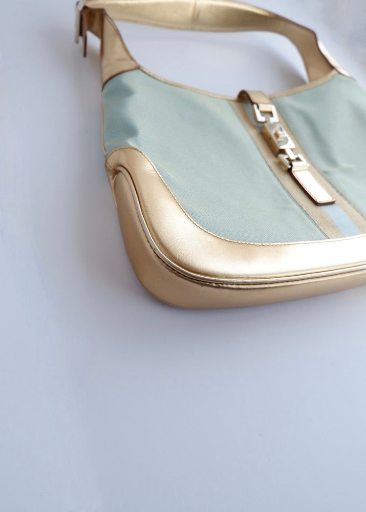 Authentique sac à bandoulière Gucci Jackie bleu/doré d'occasion