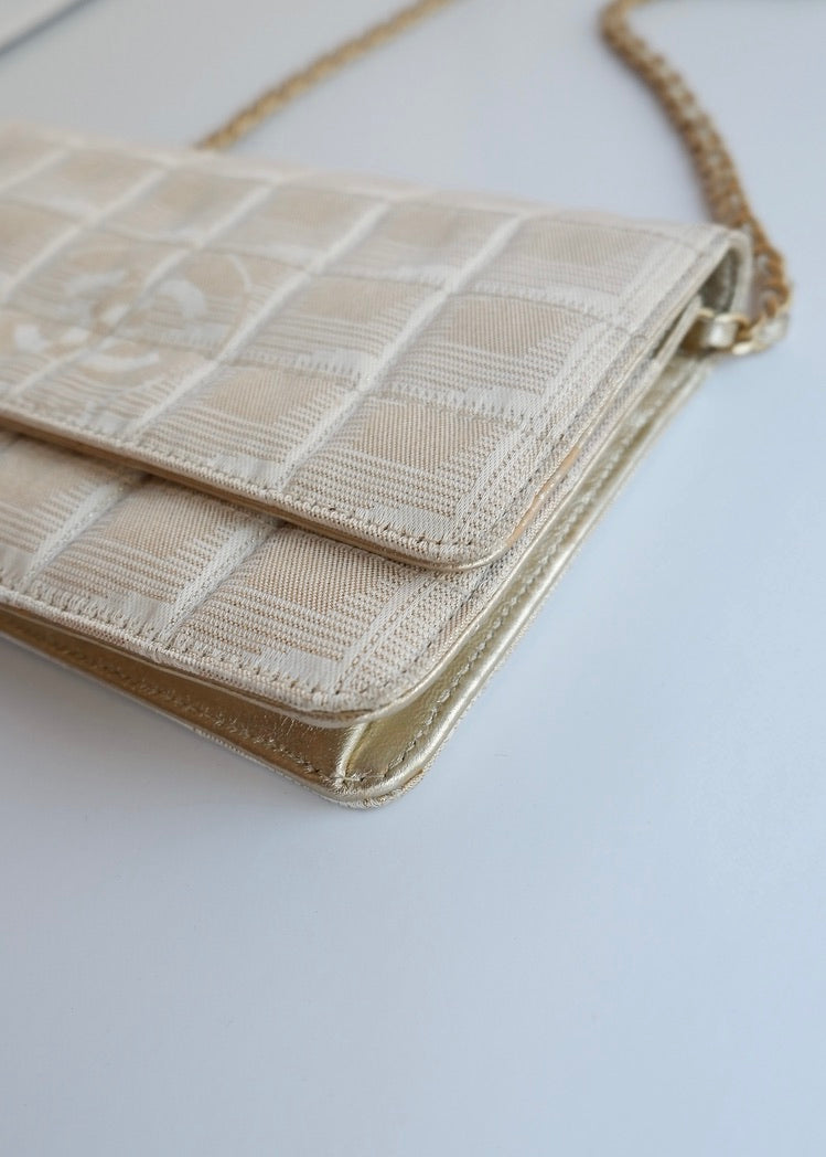 Authentic Preowned Chanel Gold Canvas New Travel Line WOC Bag