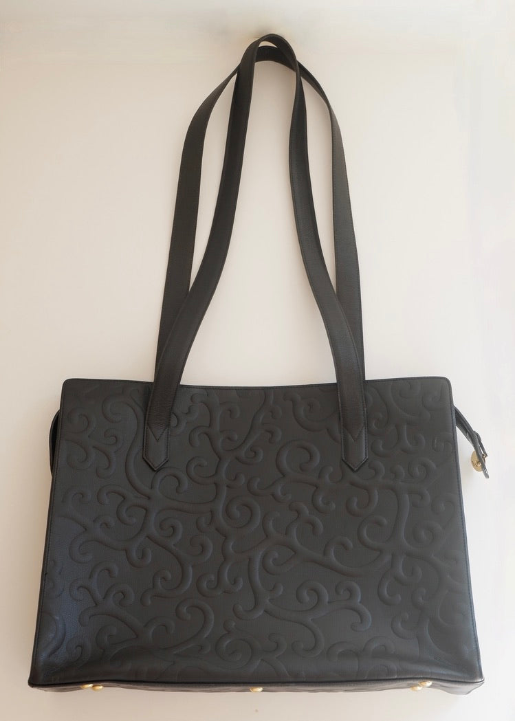 Preowned Vintage YSL Black Leather Embossed Printed Tote Bag