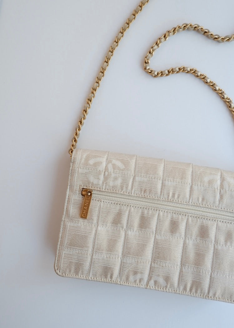 Authentic Preowned Chanel Gold Canvas New Travel Line WOC Bag