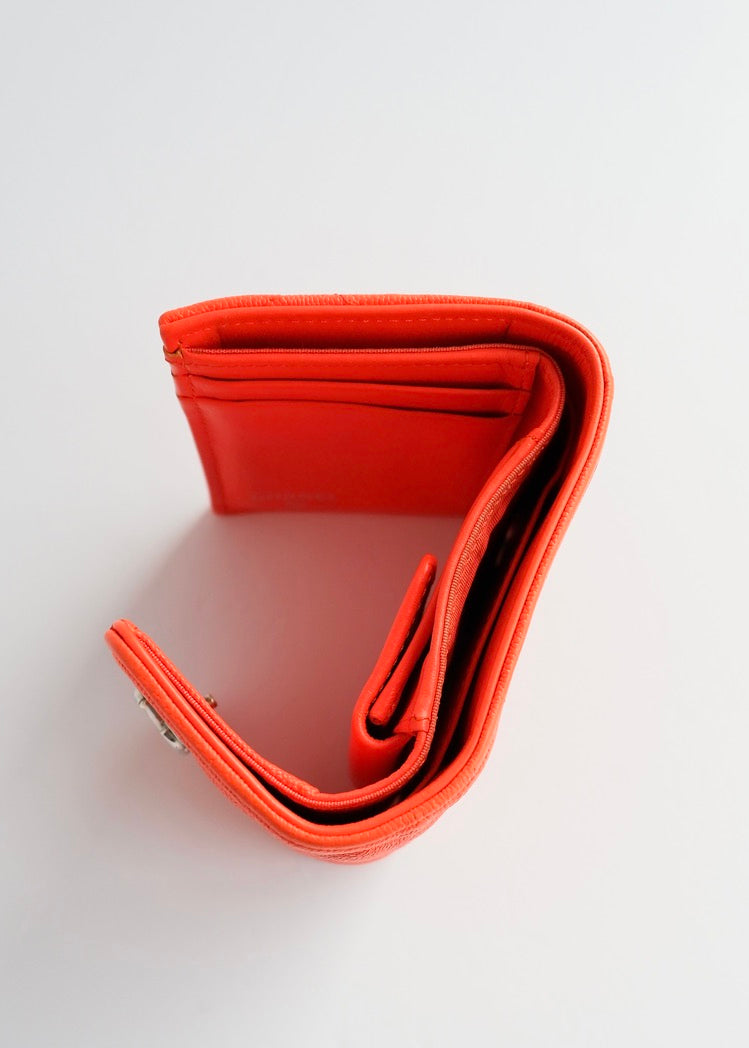 Portefeuille Chanel Boy d'occasion authentique en cuir grainé orange