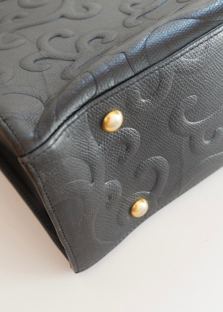 Preowned Vintage YSL Black Leather Embossed Printed Tote Bag