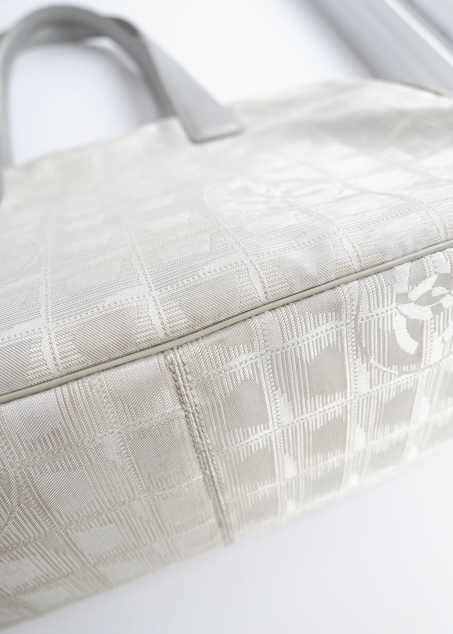 Authentic Preowned Chanel Silver Canvas New Travel Line Tote Bag