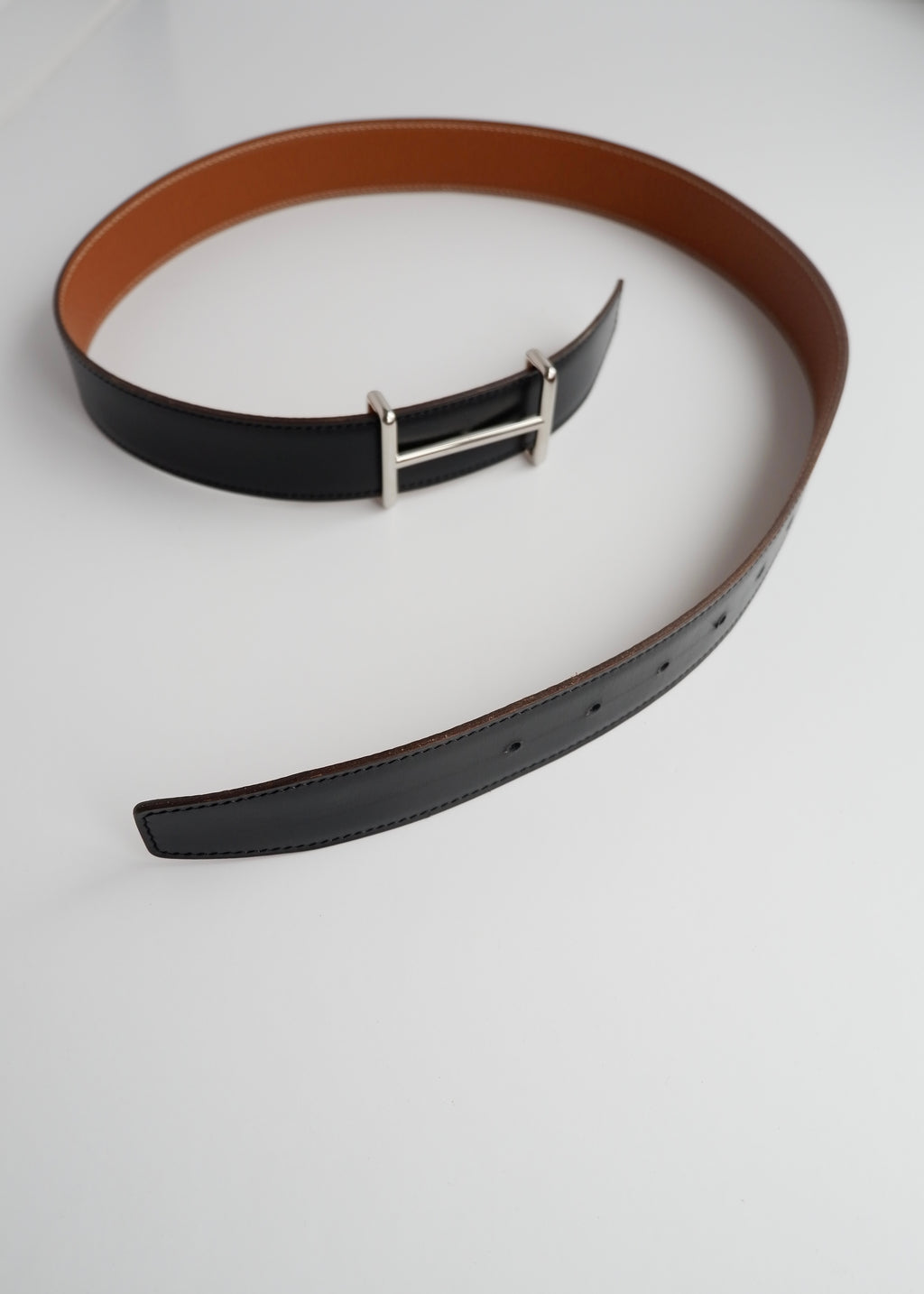 Ceinture réversible en cuir H Hermès noire/marron authentique d'occasion - 80
