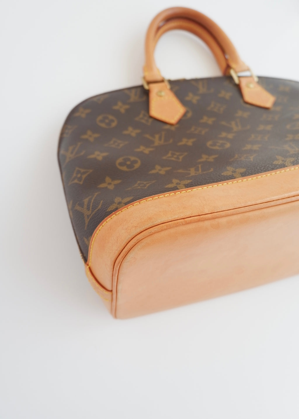 Sac à main Louis Vuitton Alma Monogram d'occasion authentique