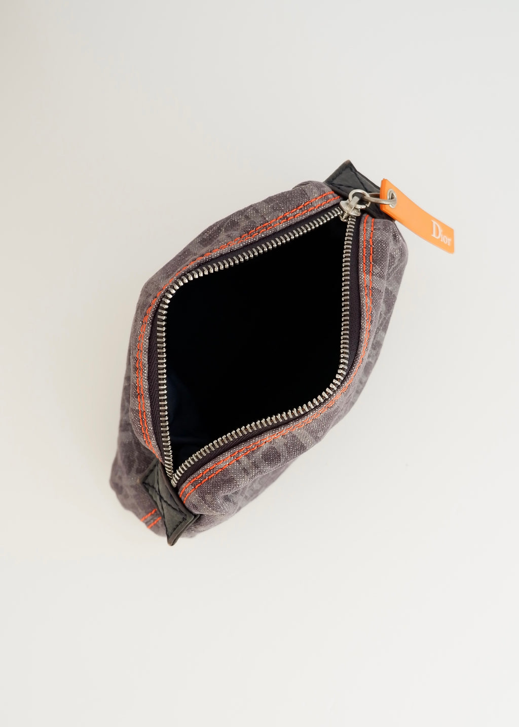 Pochette Dior en jean bleu marine motif Oblique, d'occasion et authentique