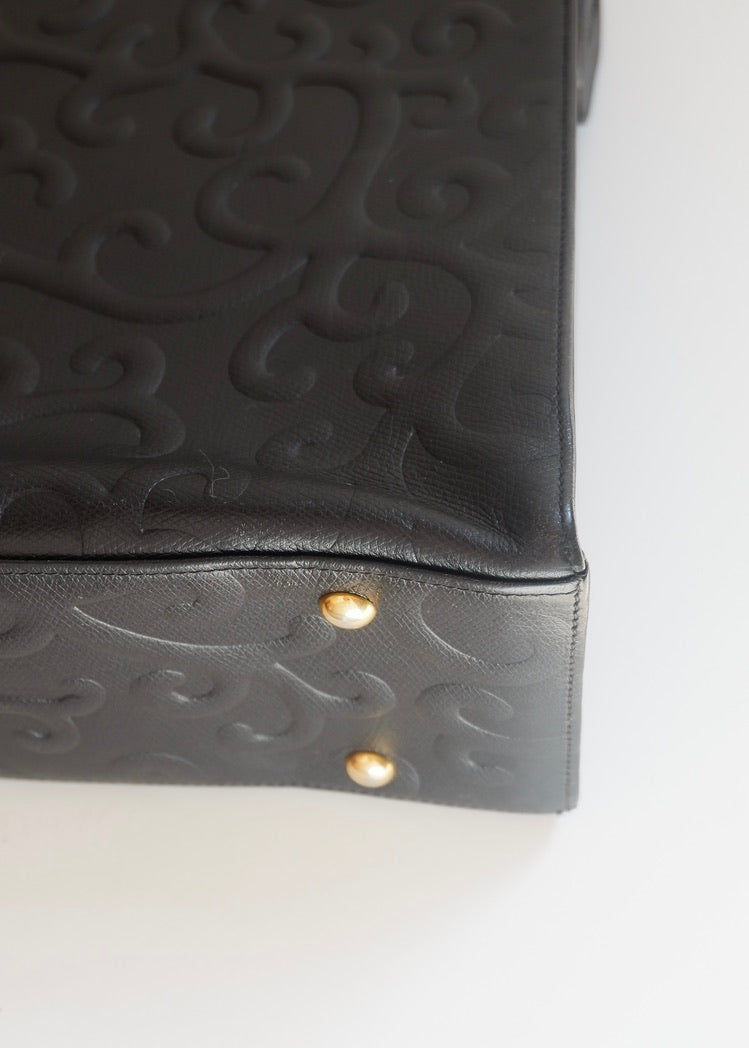 Preowned Vintage YSL Black Leather Embossed Printed Tote Bag